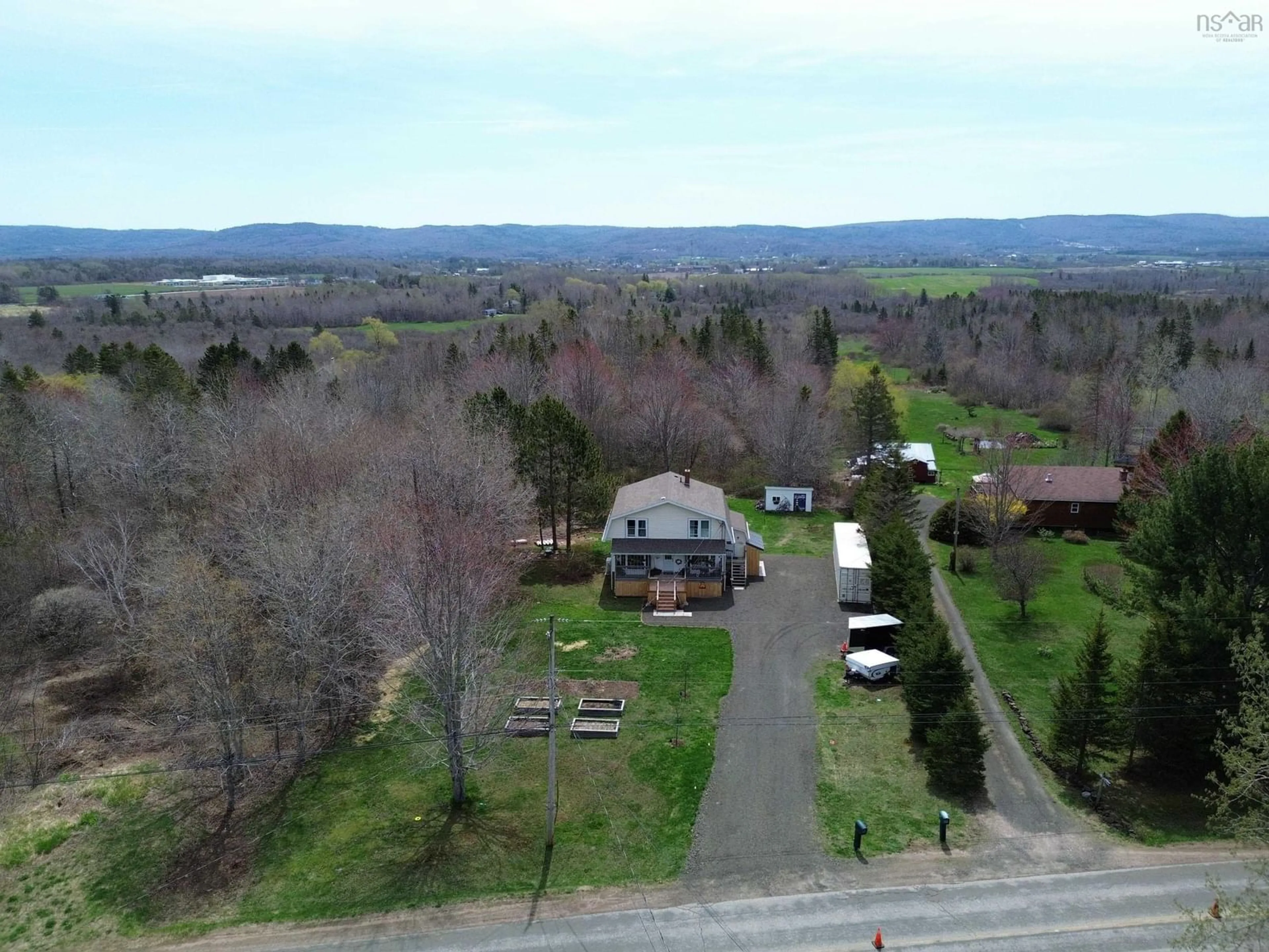 A pic from outside/outdoor area/front of a property/back of a property/a pic from drone, mountain view for 828 Clarence Rd, Beaconsfield Nova Scotia B0S 1C0