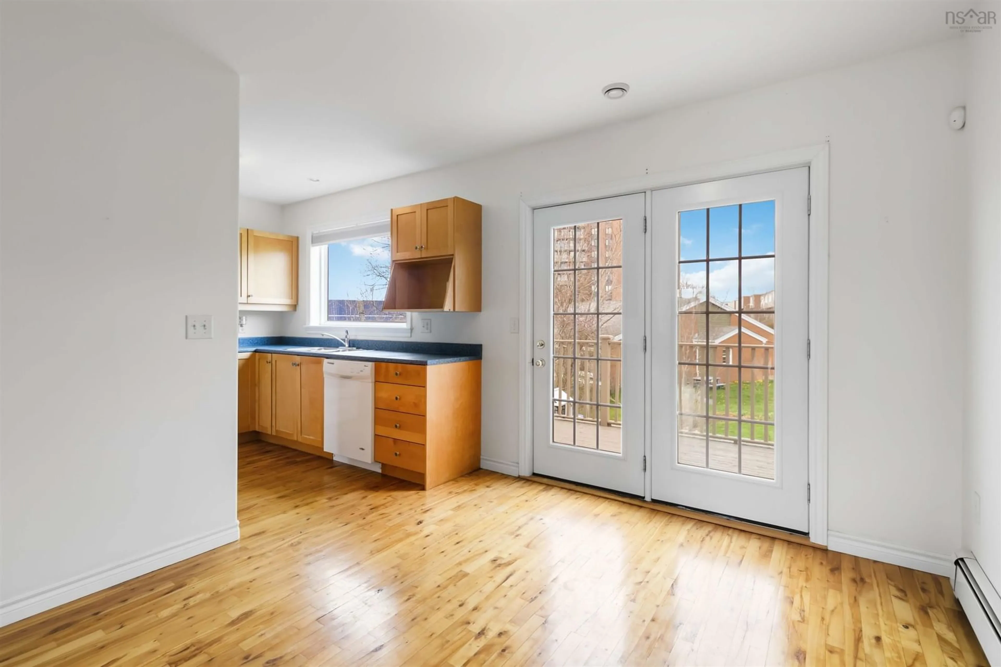 Open concept kitchen, wood/laminate floor for 5820 Gainsborough Pl, Halifax Nova Scotia B3K 6B3