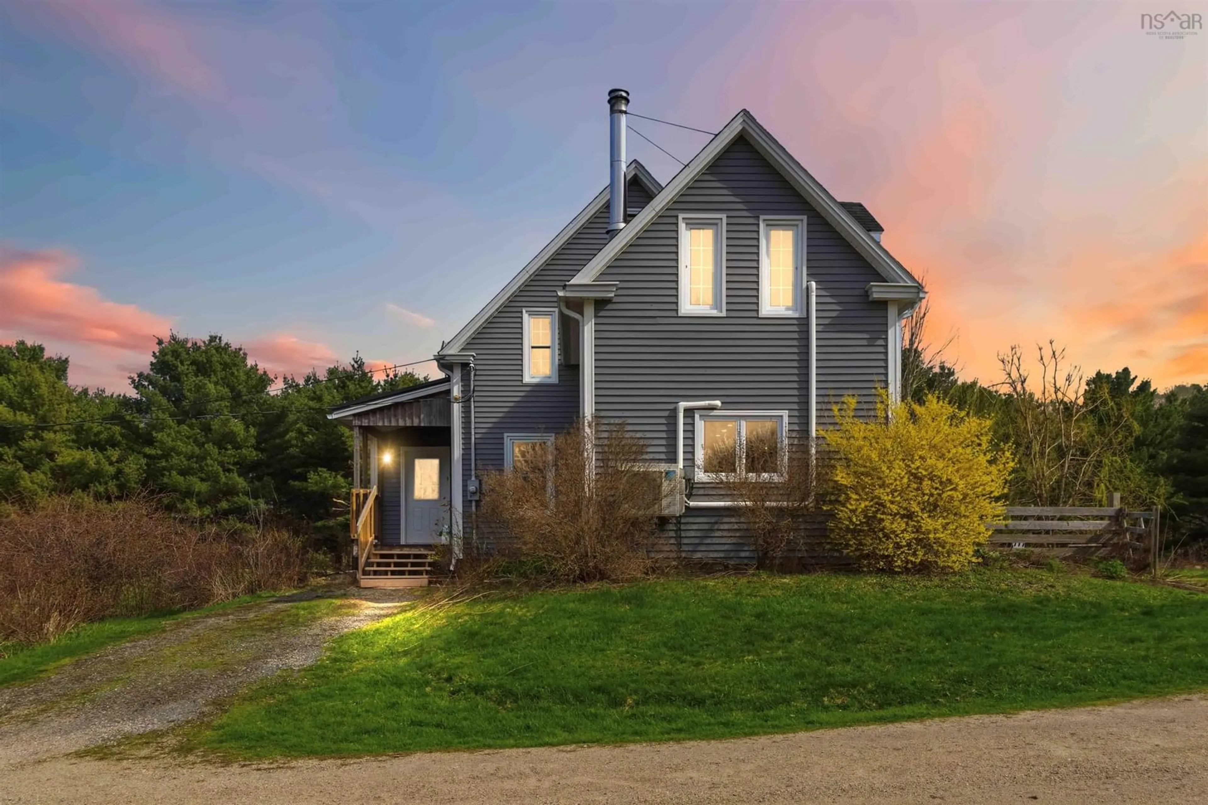 Home with vinyl exterior material, street for 2557 Cornwall Road Rd, Mahone Bay Nova Scotia B0J 2E0