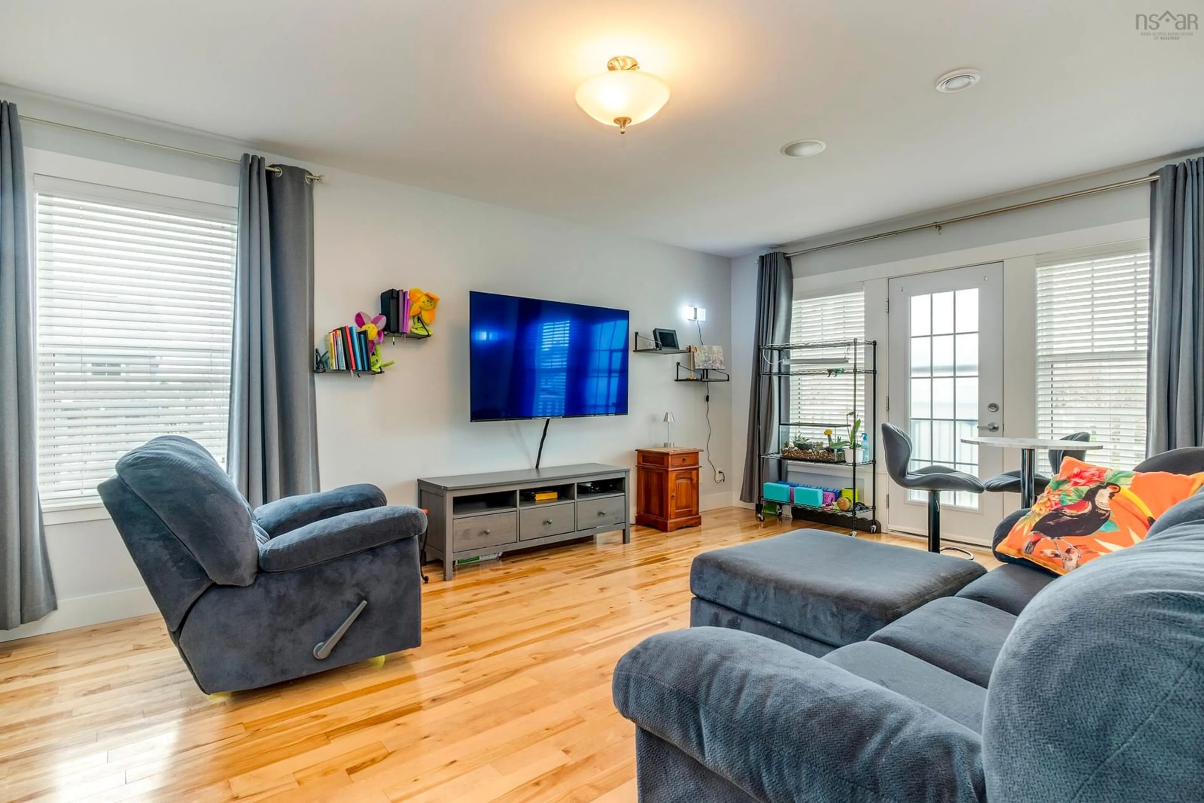 Living room with furniture, wood/laminate floor for 242 Sailors Trail, Eastern Passage Nova Scotia B3G 0A1