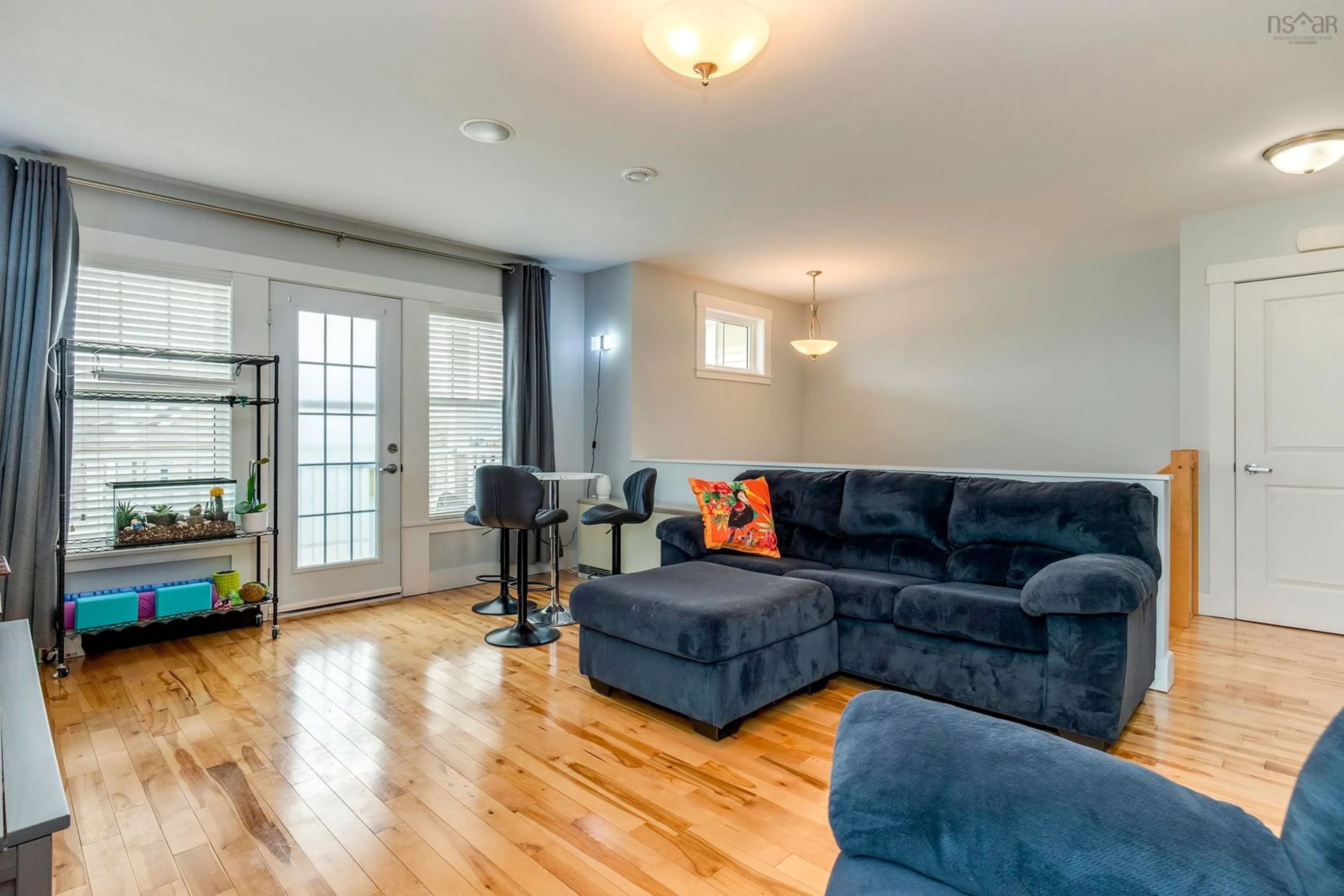 Living room with furniture, wood/laminate floor for 242 Sailors Trail, Eastern Passage Nova Scotia B3G 0A1