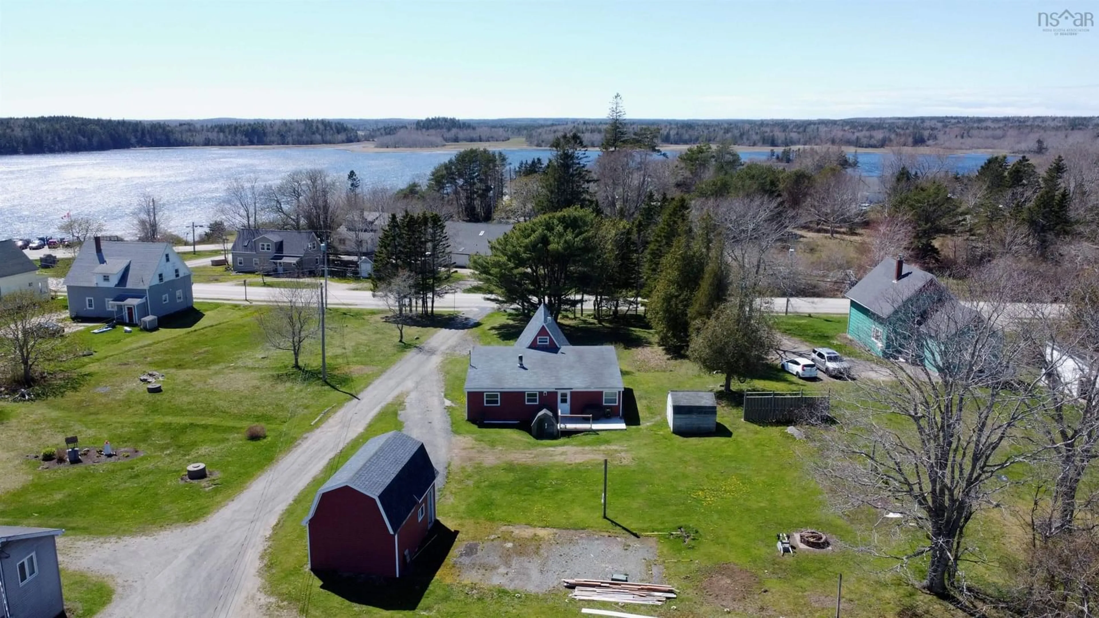 A pic from outside/outdoor area/front of a property/back of a property/a pic from drone, water/lake/river/ocean view for 5 Chase Dr, Tusket Nova Scotia B0W 3M0