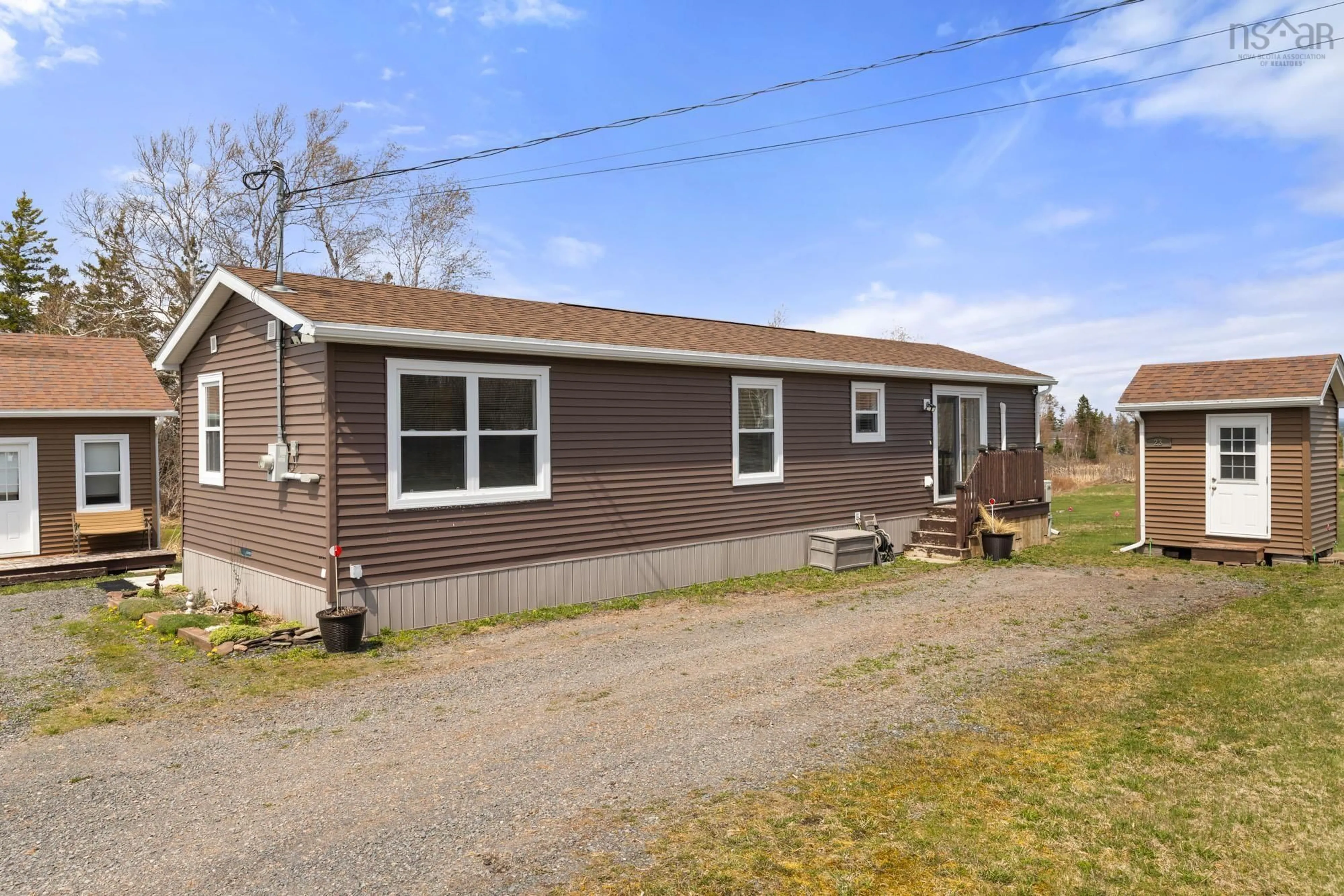 Home with vinyl exterior material, street for 23 Heron Dr, Caribou River Nova Scotia B0K 1H0