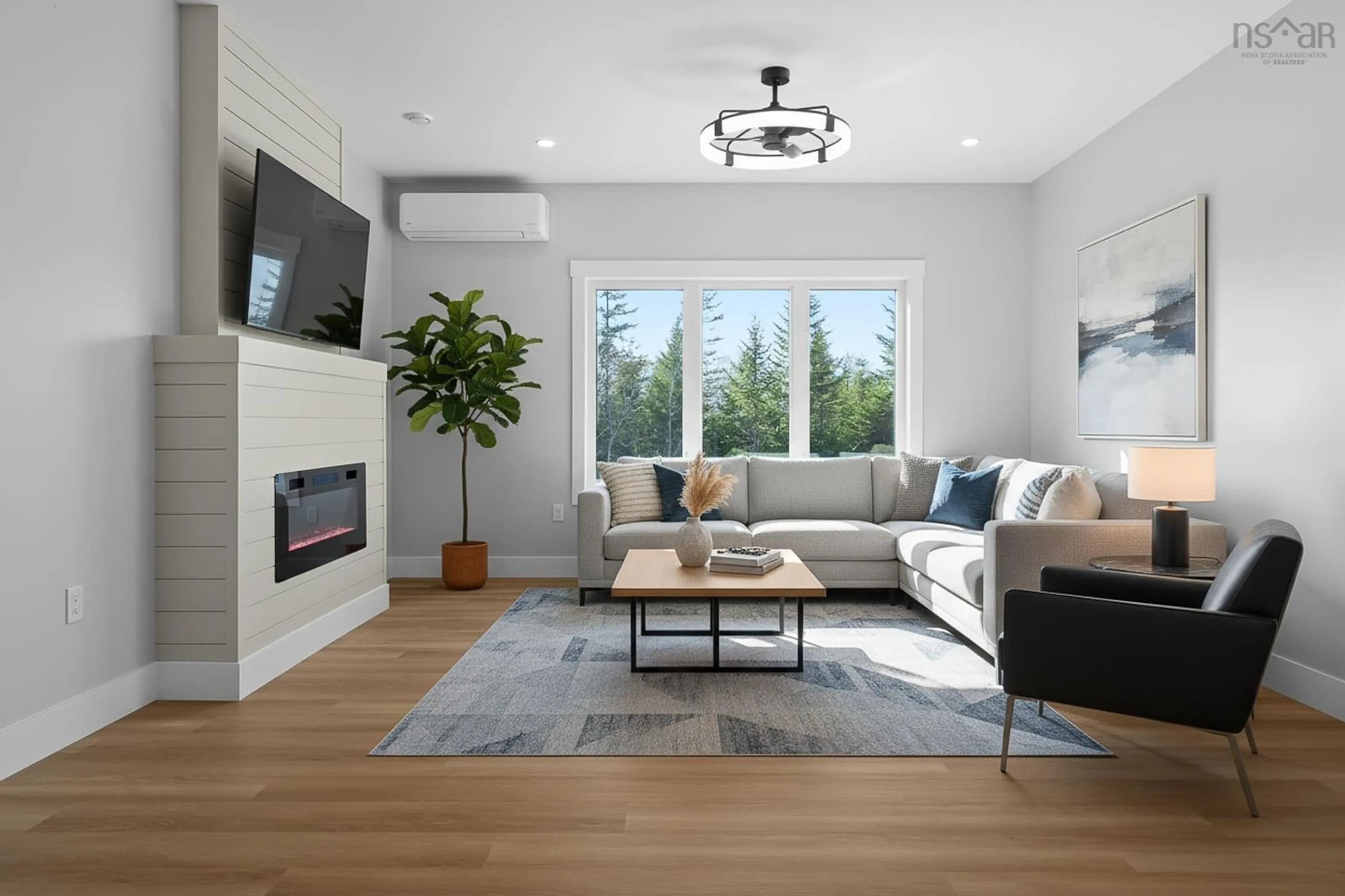 Living room with furniture, wood/laminate floor for 122 Zaffre Dr, Middle Sackville Nova Scotia B4E 0P5