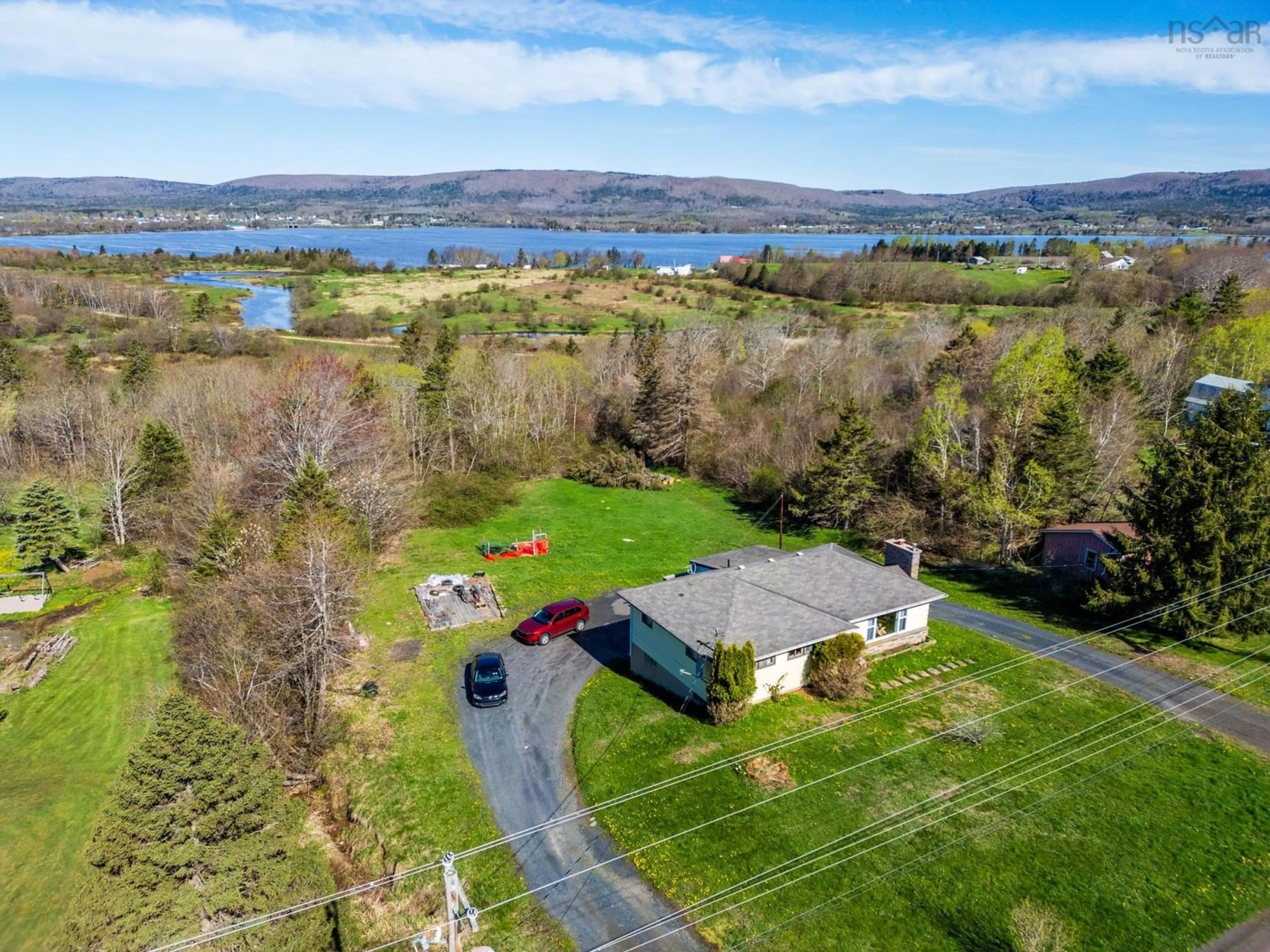 A pic from outside/outdoor area/front of a property/back of a property/a pic from drone, water/lake/river/ocean view for 301 Highway 201, Moschelle Nova Scotia B0S 1A0
