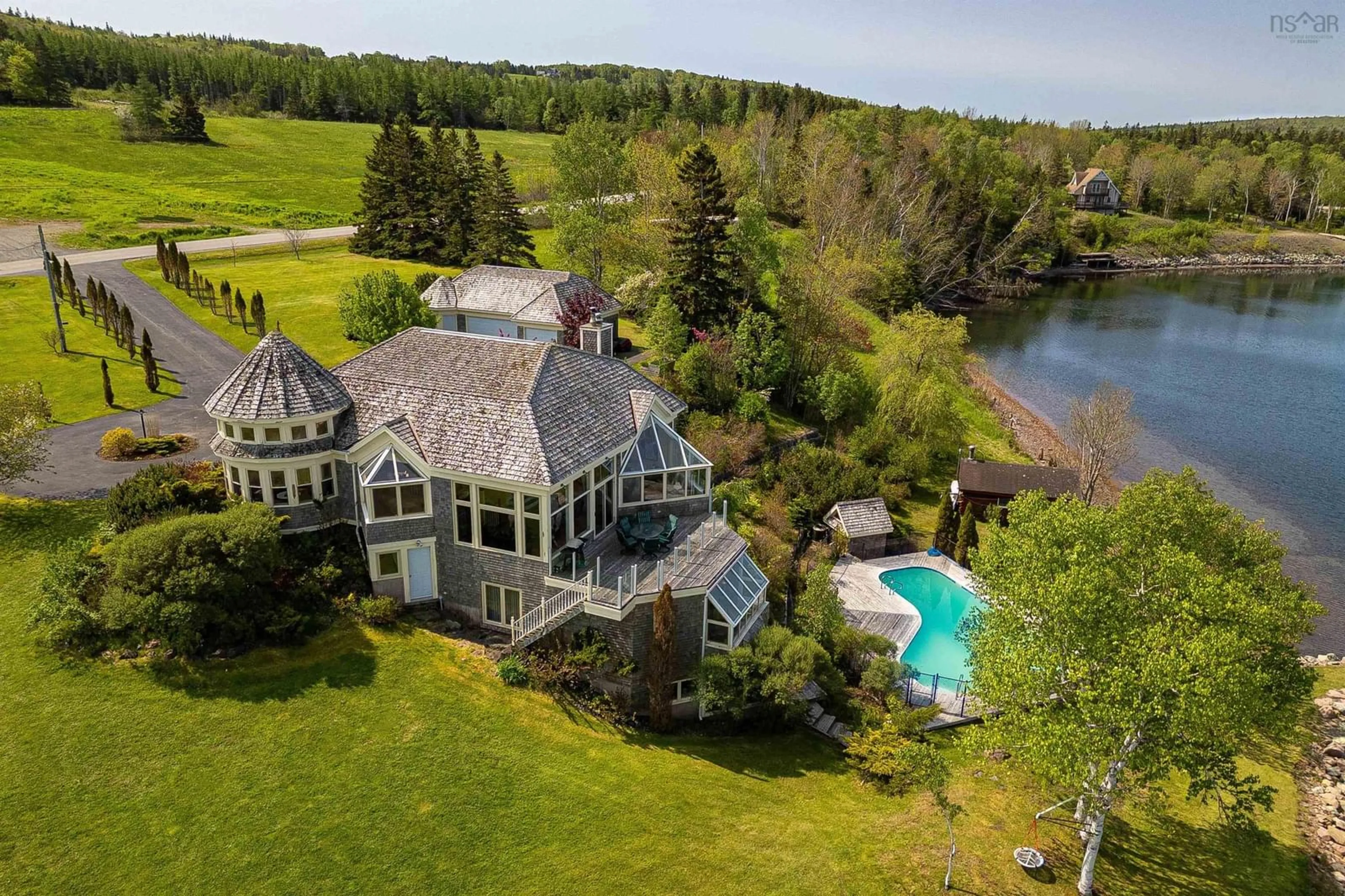 A pic from outside/outdoor area/front of a property/back of a property/a pic from drone, water/lake/river/ocean view for 2641 West Bay Rd, Dundee Nova Scotia B0E 3K0