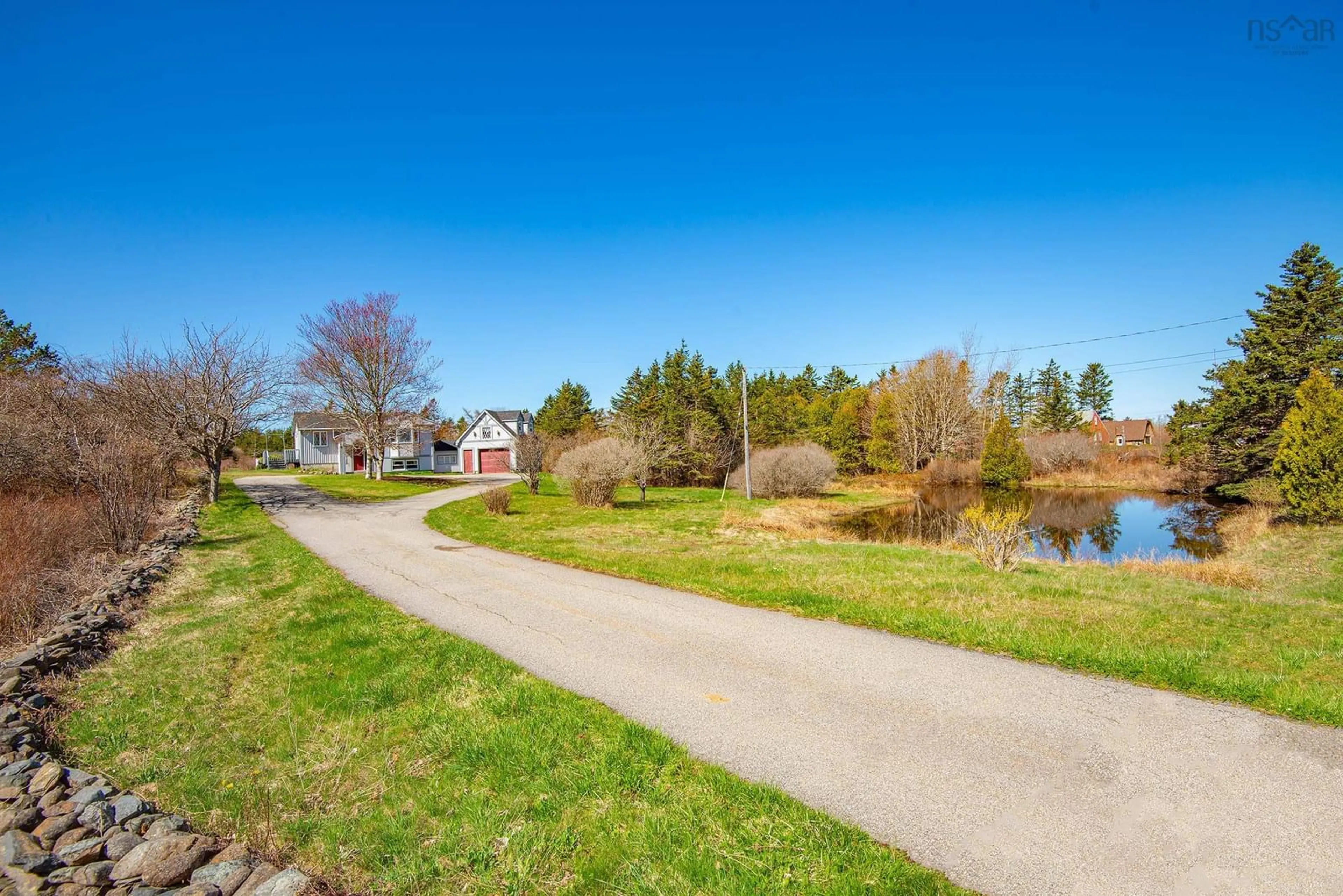 A pic from outside/outdoor area/front of a property/back of a property/a pic from drone, water/lake/river/ocean view for 226 Peter Dugas Road, Meteghan Nova Scotia B0W 2J0