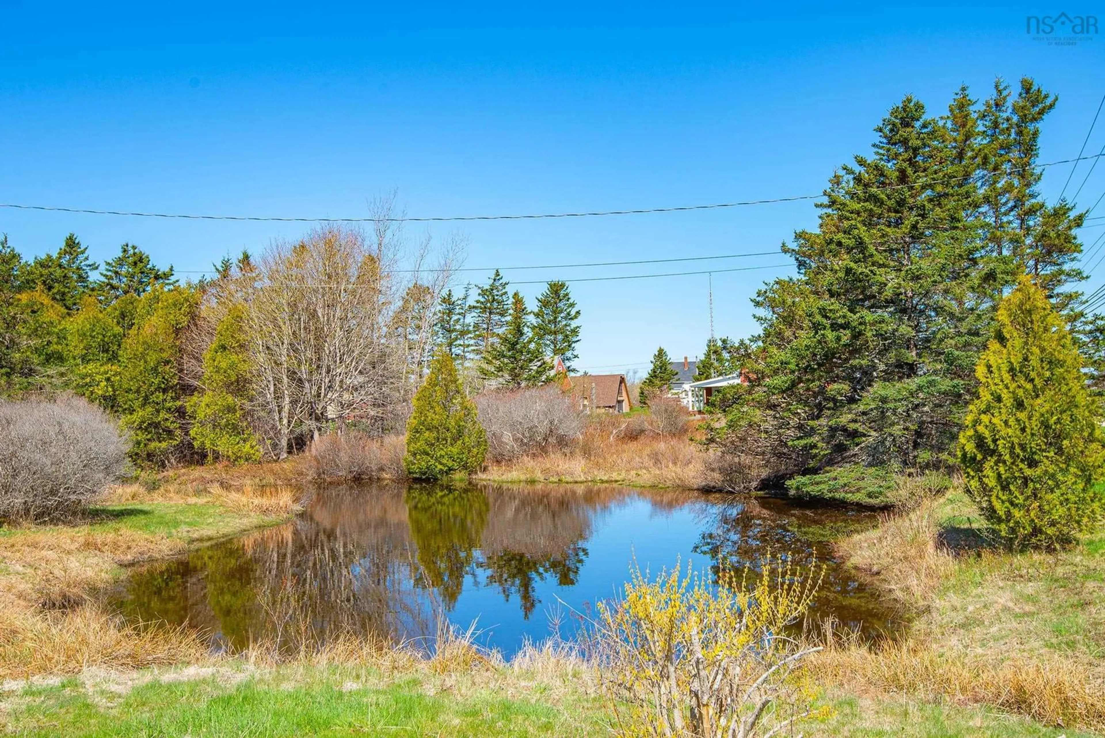 A pic from outside/outdoor area/front of a property/back of a property/a pic from drone, water/lake/river/ocean view for 226 Peter Dugas Road, Meteghan Nova Scotia B0W 2J0