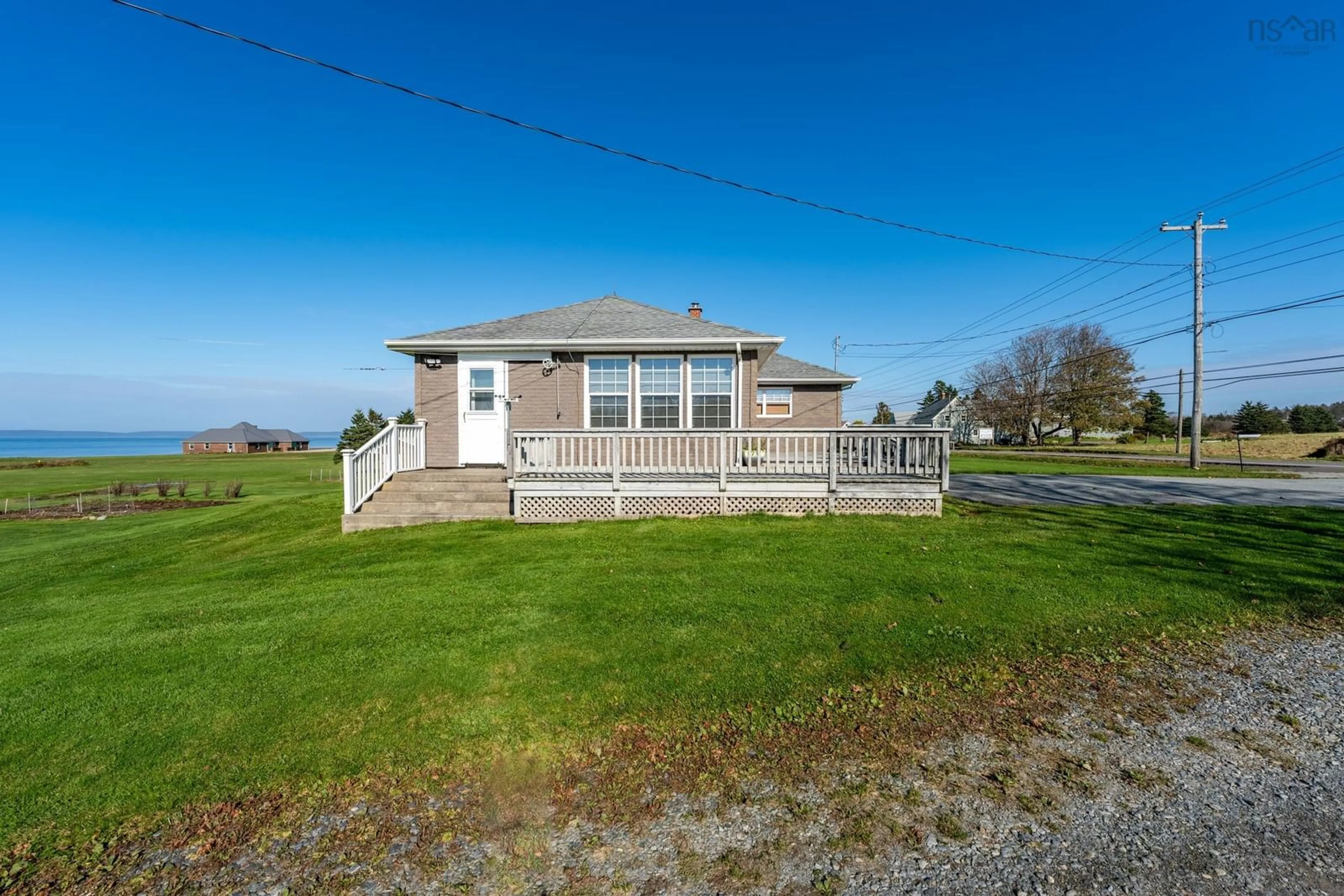 A pic from outside/outdoor area/front of a property/back of a property/a pic from drone, water/lake/river/ocean view for 1271 Highway 1, Little Brook Nova Scotia B0W 1M0