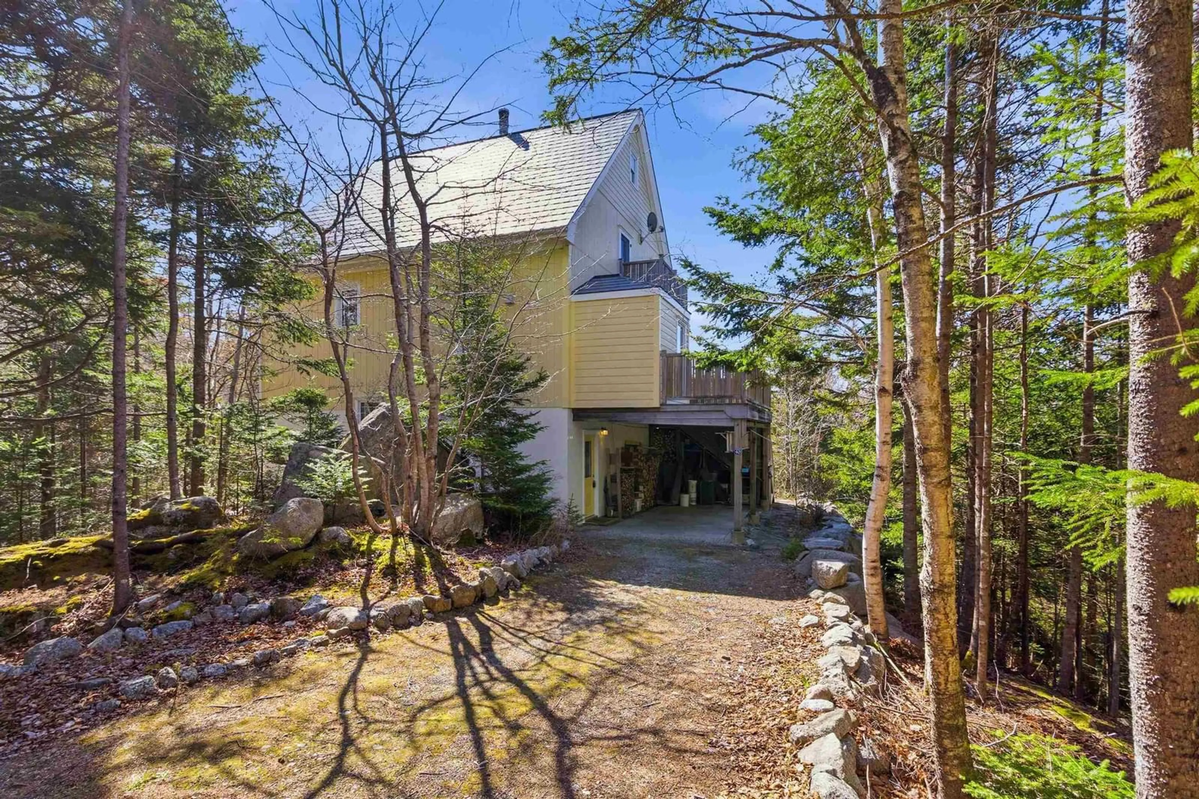 A pic from outside/outdoor area/front of a property/back of a property/a pic from drone, forest/trees view for 40 Big Rock Lane, East Chester Nova Scotia B0J 1J0