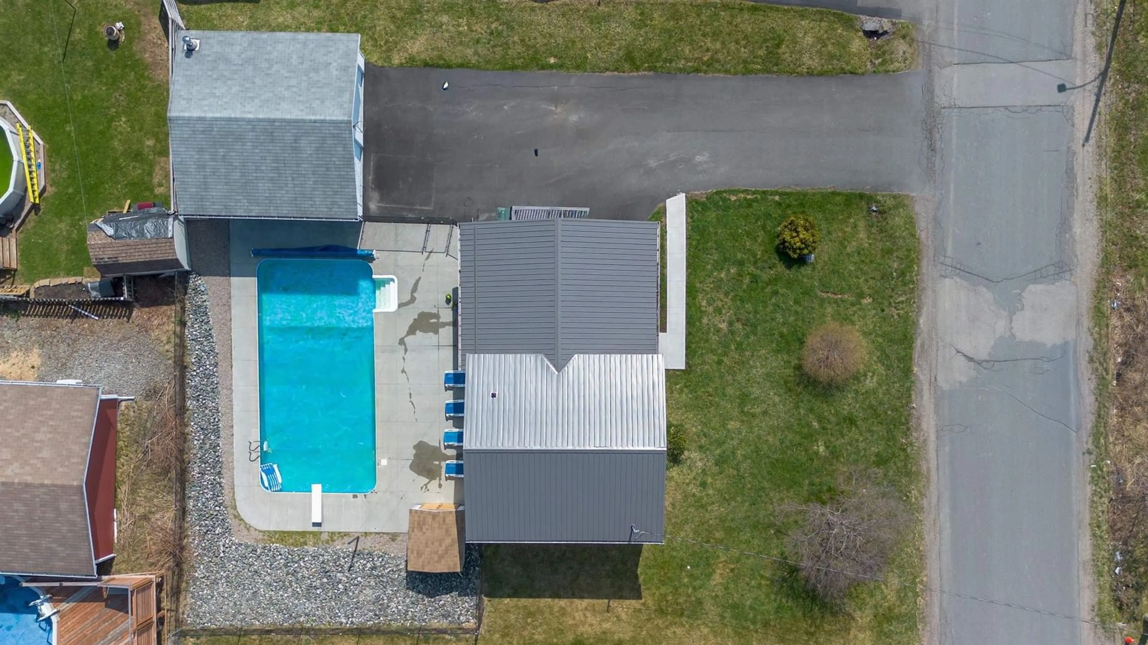 A pic from outside/outdoor area/front of a property/back of a property/a pic from drone, street for 65 Macdonald Cres, Sydney Mines Nova Scotia B1V 3L9