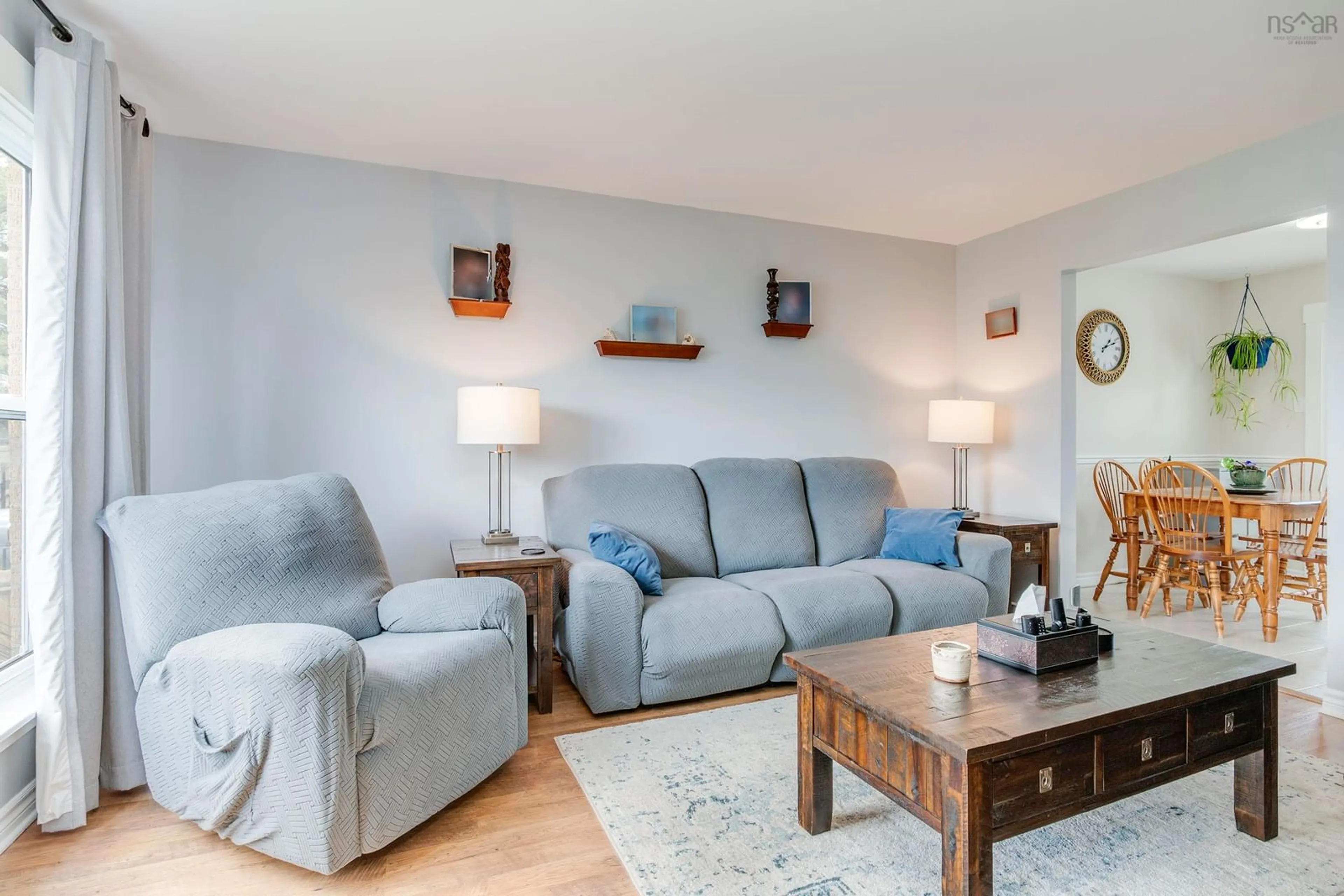 Living room with furniture, wood/laminate floor for 10 Shrewsbury Rd, Cole Harbour Nova Scotia B2V 1R7