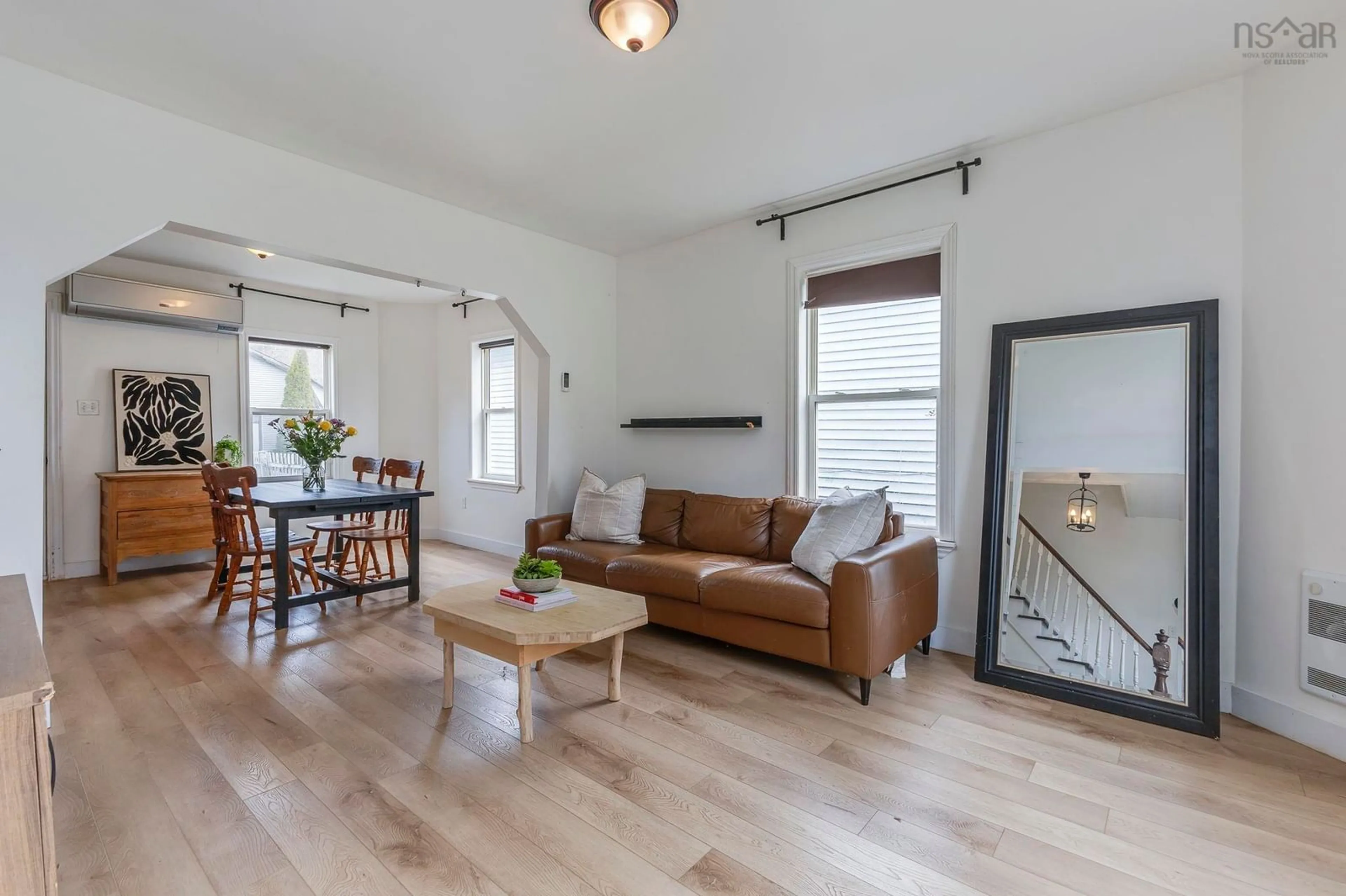 Living room with furniture, wood/laminate floor for 19 Station Rd, South Maitland Nova Scotia B0N 2H0
