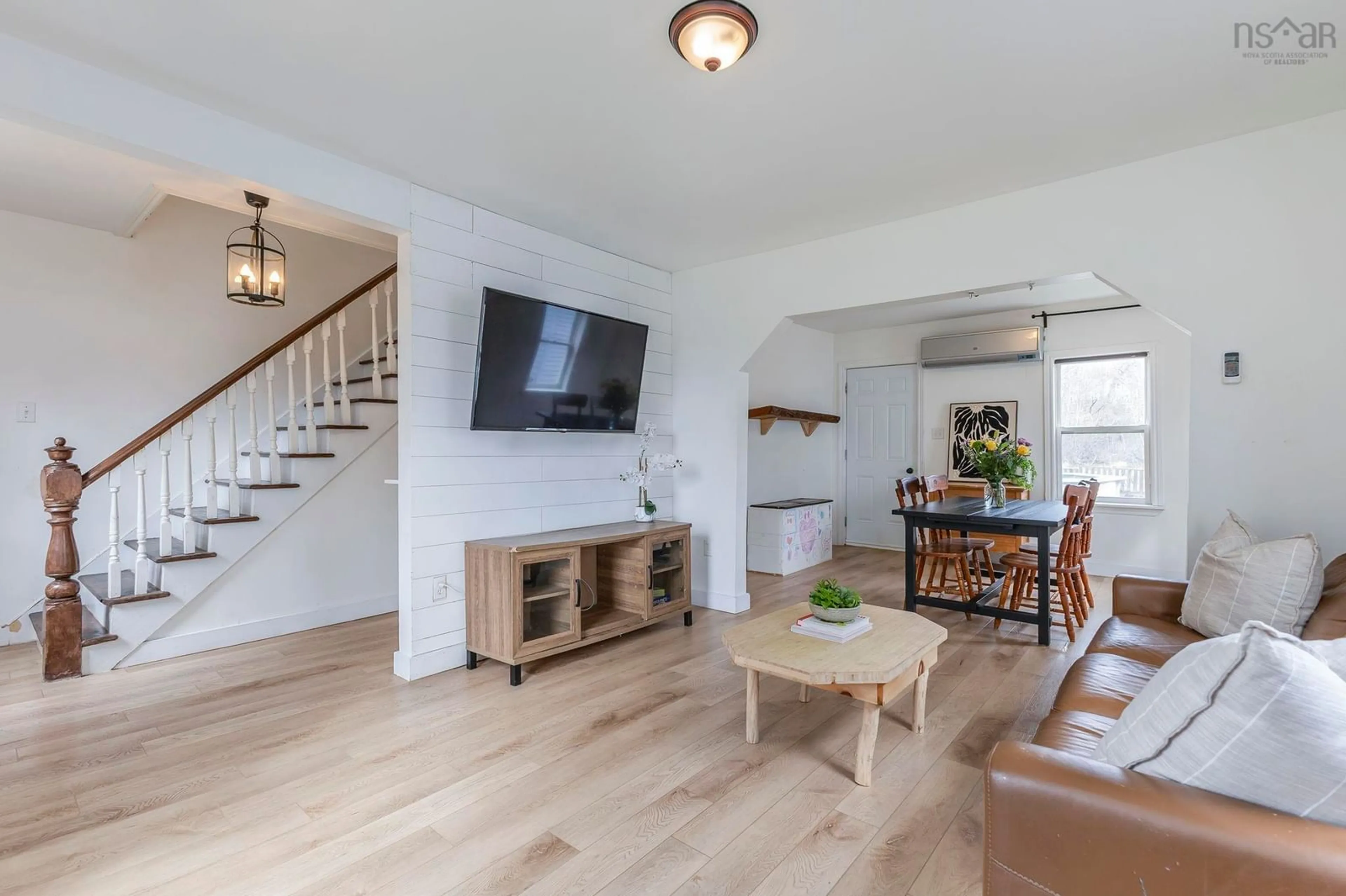 Living room with furniture, wood/laminate floor for 19 Station Rd, South Maitland Nova Scotia B0N 2H0