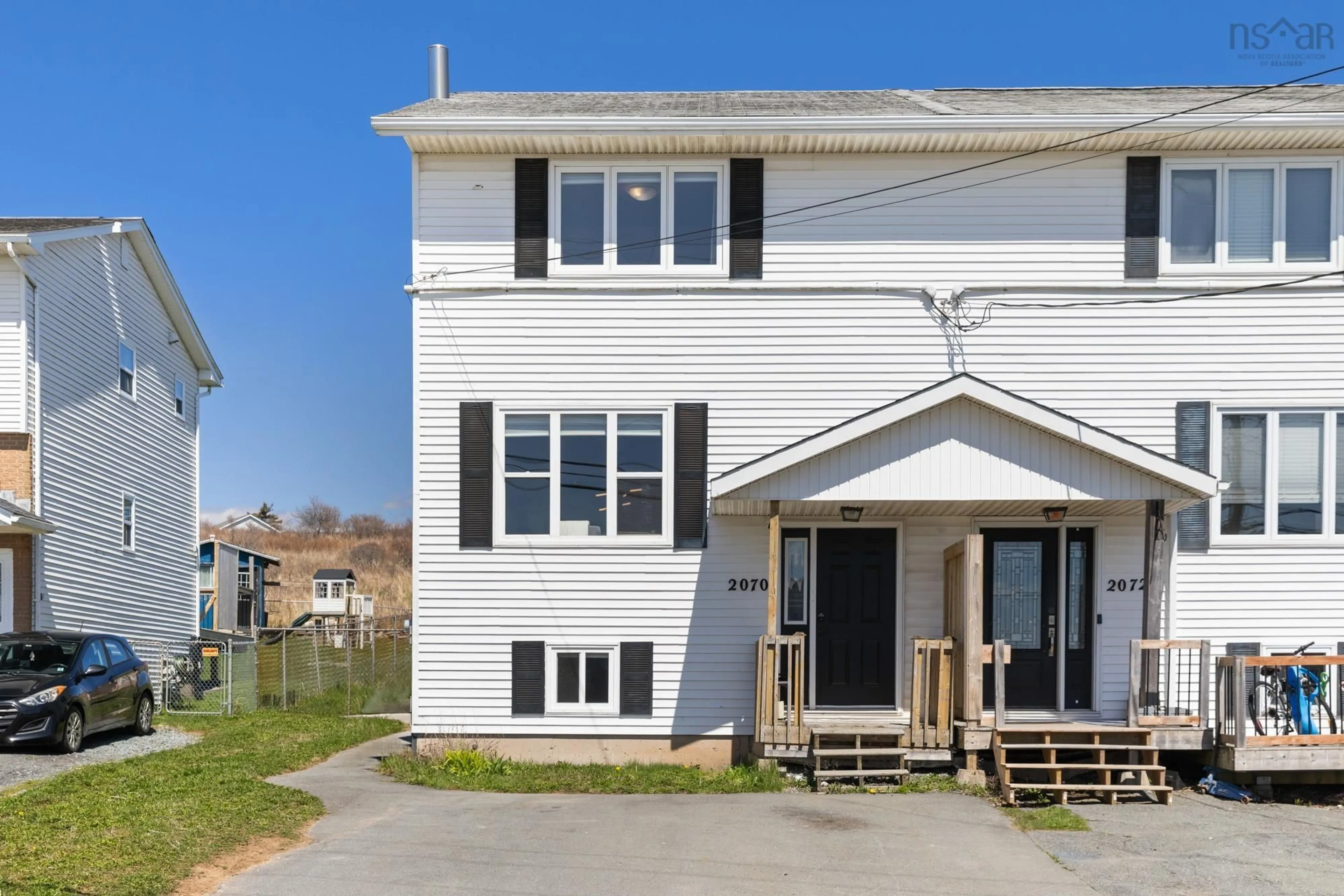 Home with vinyl exterior material, street for 2070 Caldwell Rd, Eastern Passage Nova Scotia B3G 1H7