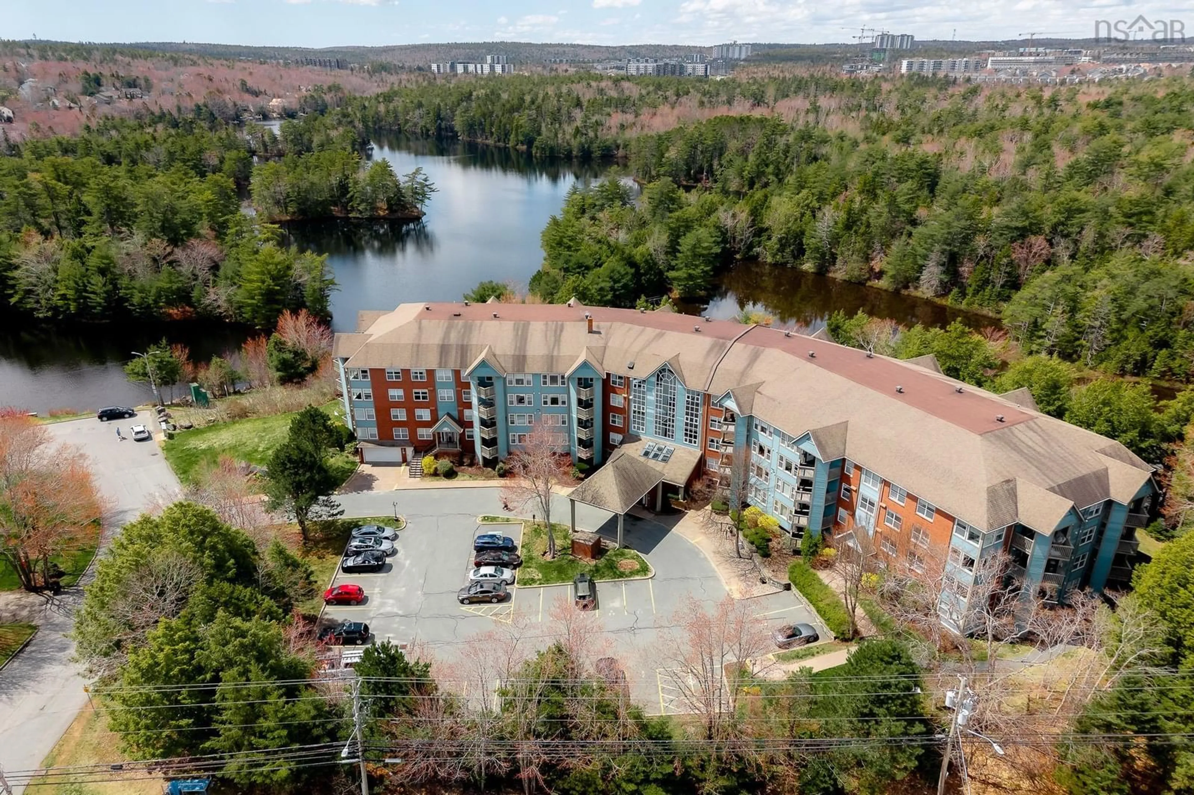 A pic from outside/outdoor area/front of a property/back of a property/a pic from drone, water/lake/river/ocean view for 2 Lake Dr #407, Bedford Nova Scotia B4A 4H7
