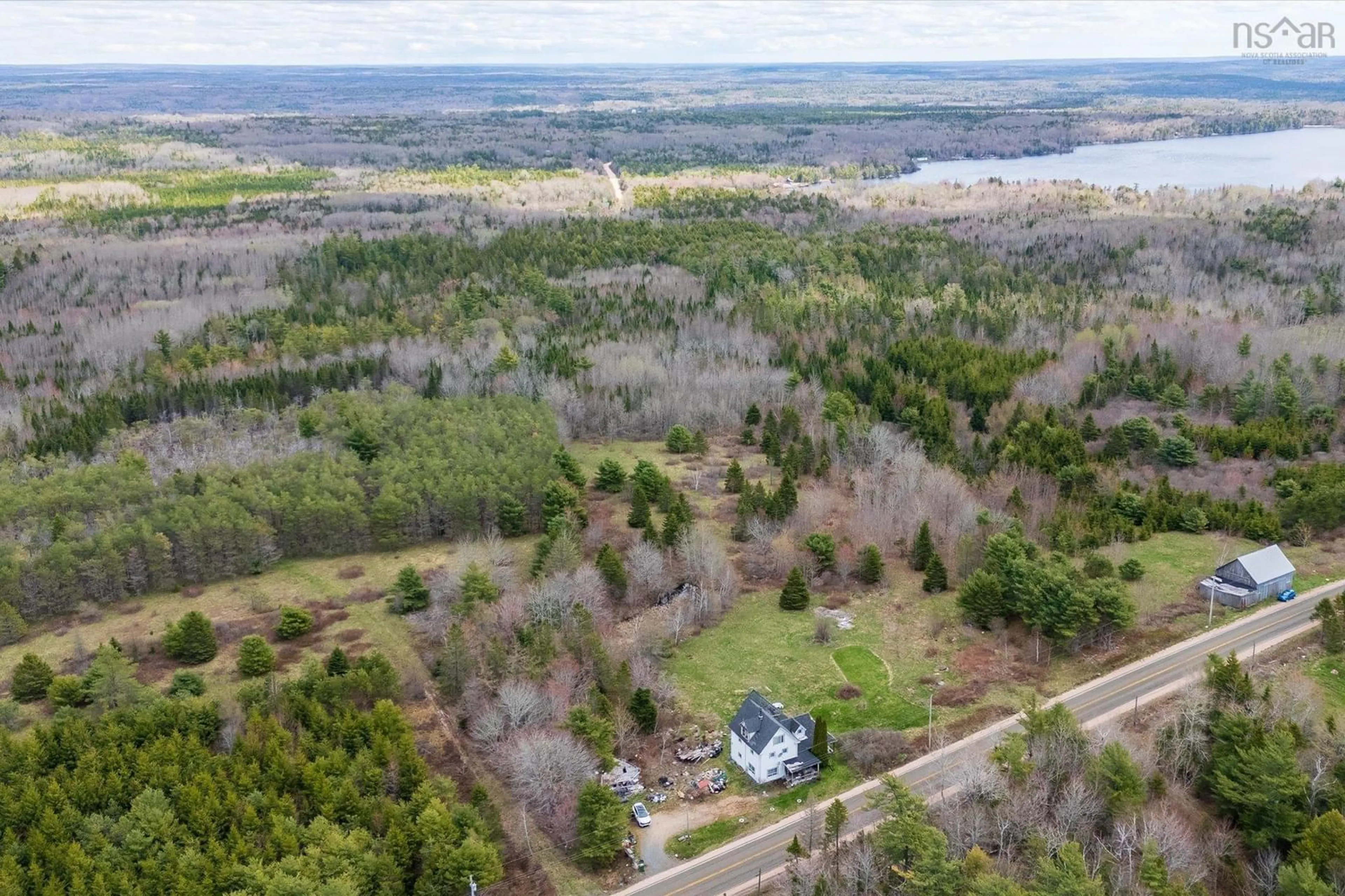 A pic from outside/outdoor area/front of a property/back of a property/a pic from drone, water/lake/river/ocean view for 1170 Highway 10, Springfield Nova Scotia B0R 1H0