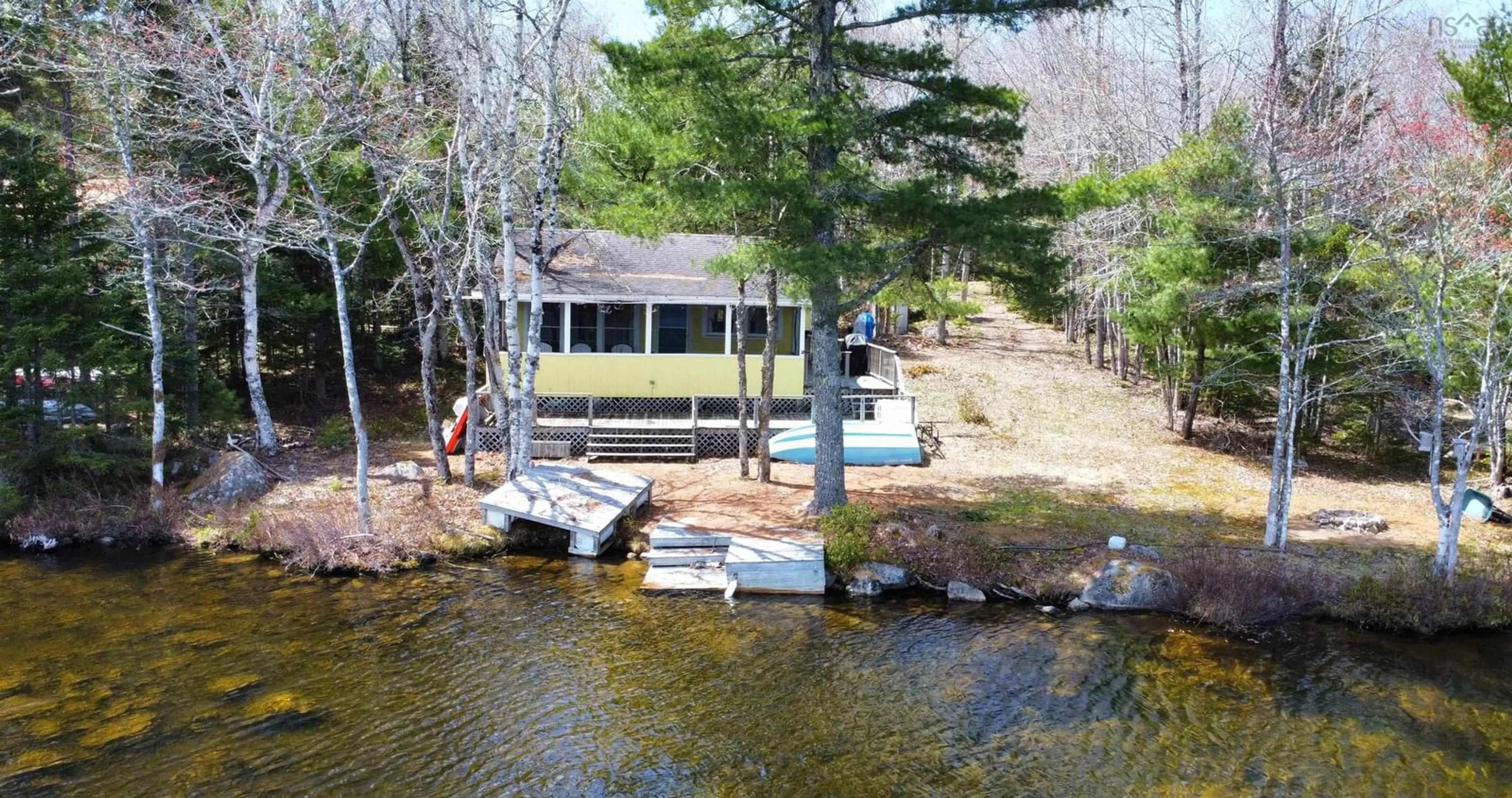 A pic from outside/outdoor area/front of a property/back of a property/a pic from drone, water/lake/river/ocean view for 134 Zwickers Lake Rd, New Albany Nova Scotia B0S 1P0