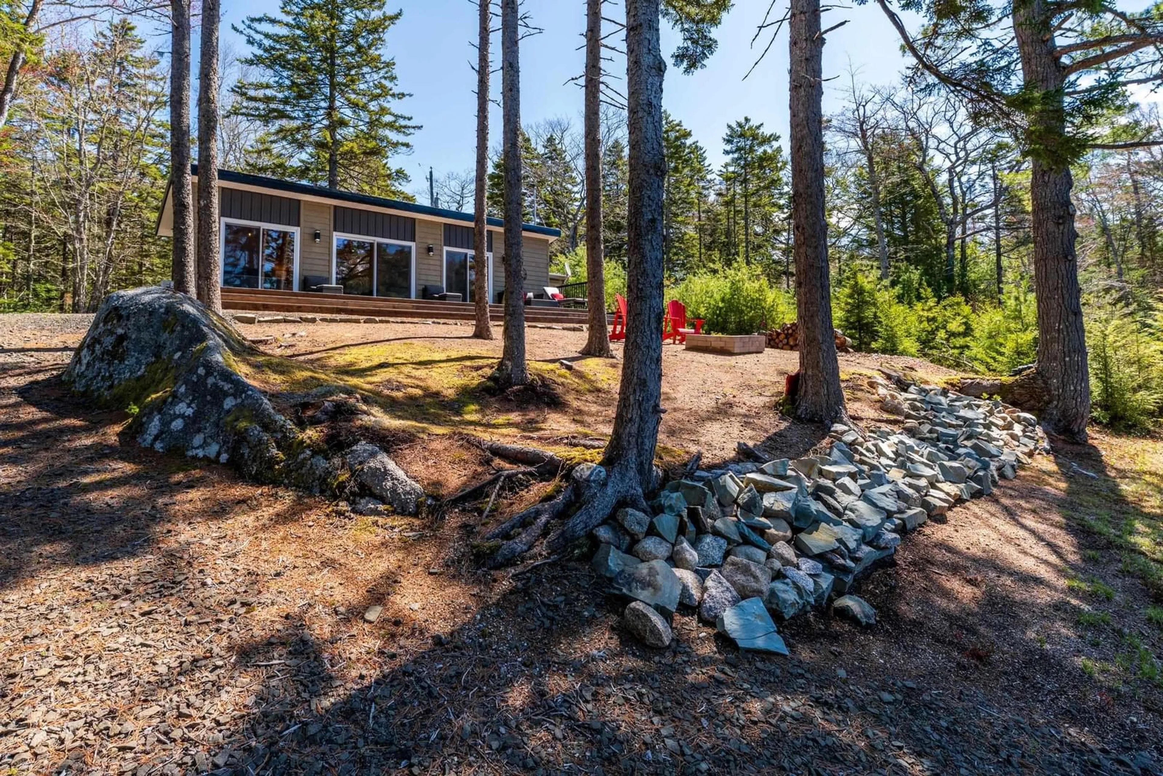 A pic from outside/outdoor area/front of a property/back of a property/a pic from drone, forest/trees view for 434 Mirror Point Dr, Graywood Nova Scotia B0S 1A0