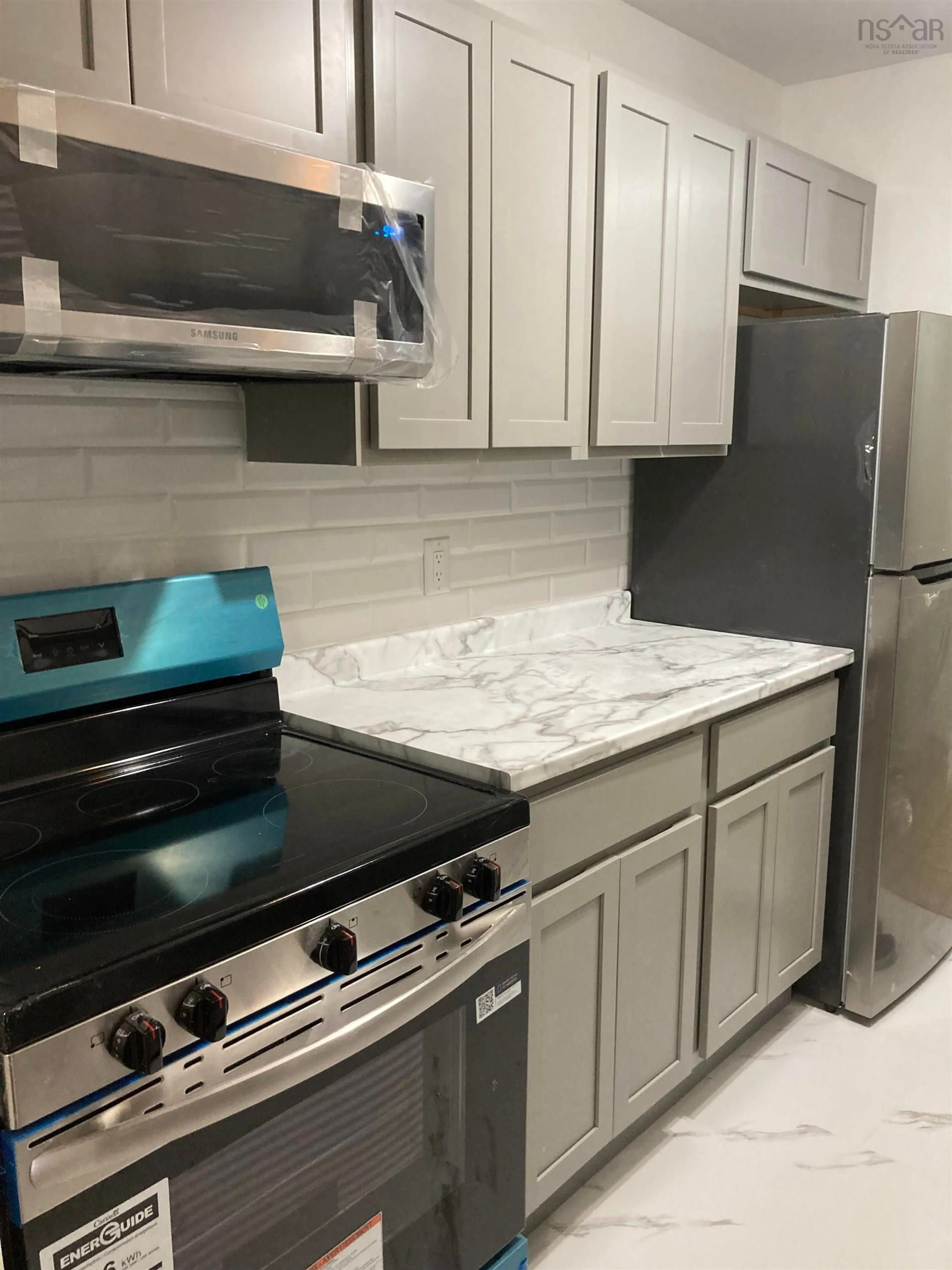 Standard kitchen, ceramic/tile floor for 15 Langbrae Dr #103, Halifax Nova Scotia B3M 3W5