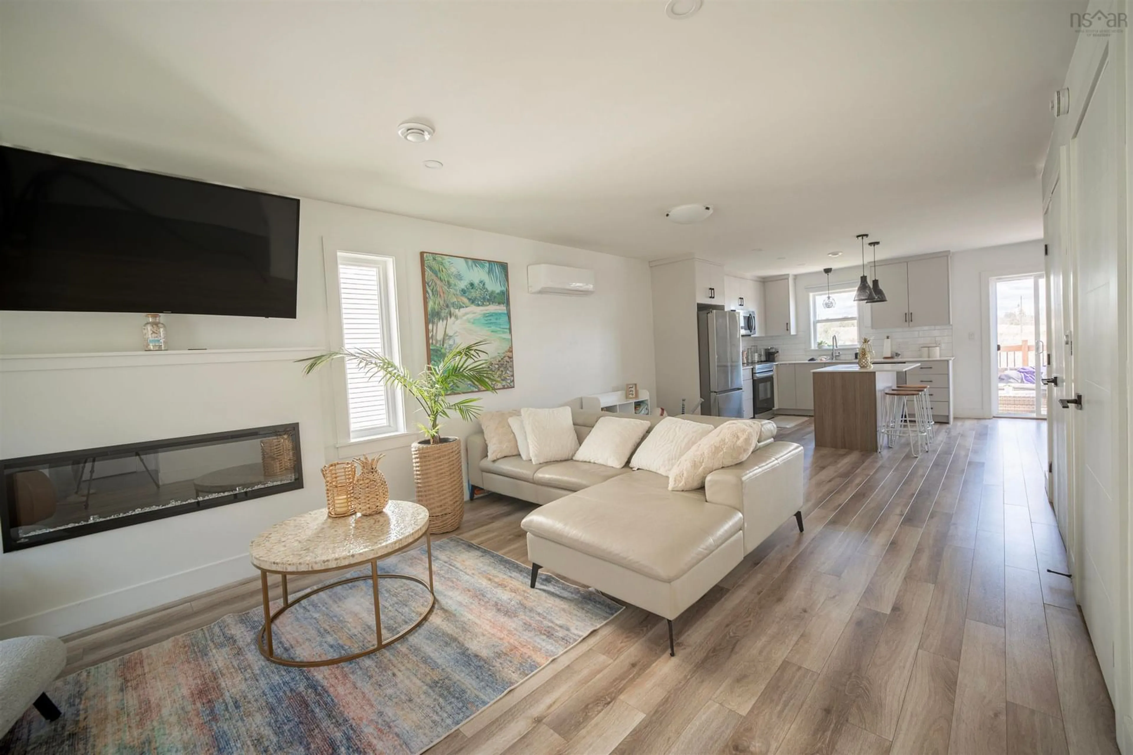 Living room with furniture, wood/laminate floor for 588  A Herring Cove Rd, Halifax Nova Scotia B3R 1X6