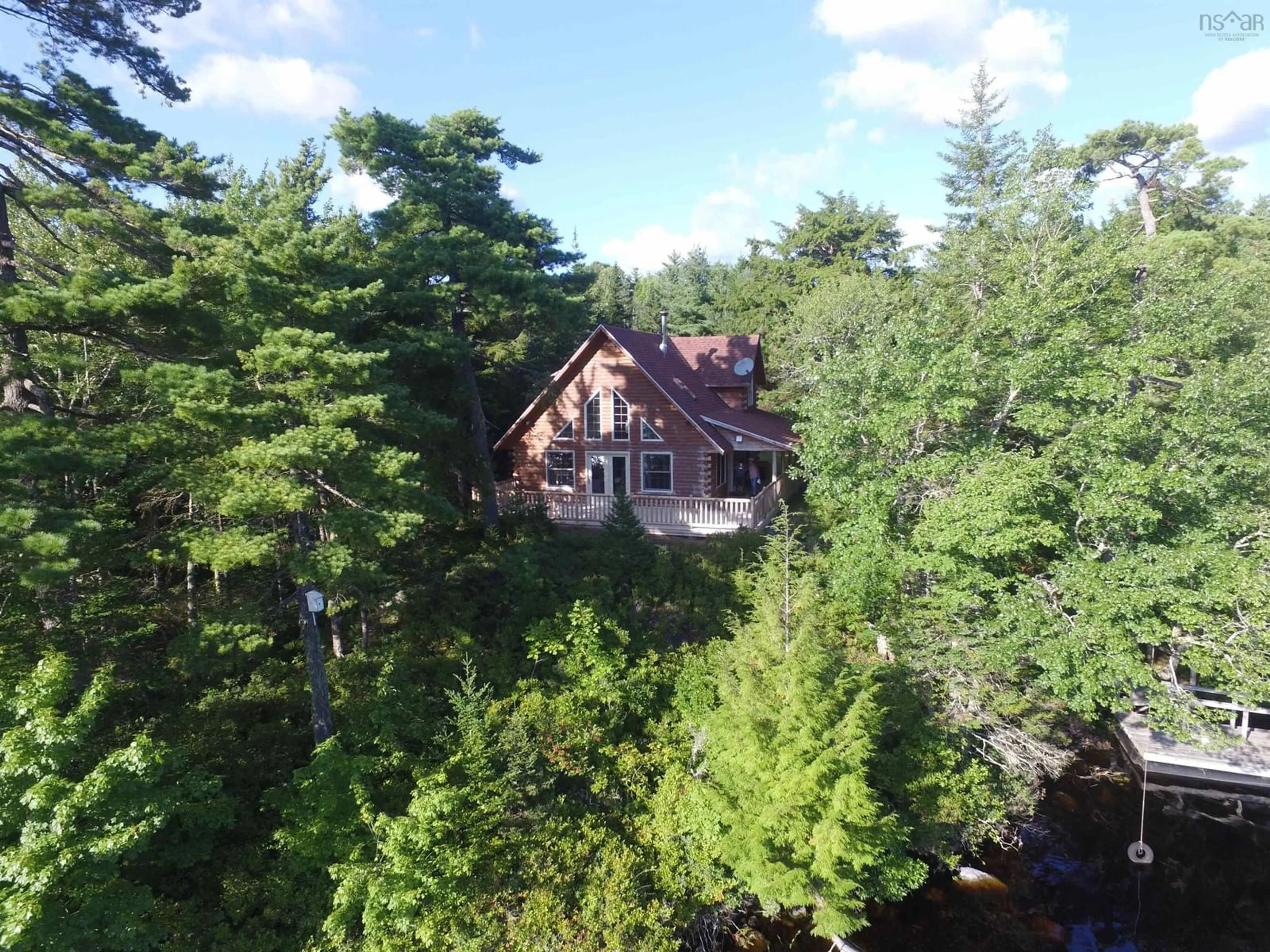 A pic from outside/outdoor area/front of a property/back of a property/a pic from drone, forest/trees view for 78 Green Island Rd, Lower Ohio Nova Scotia B0T 1W0