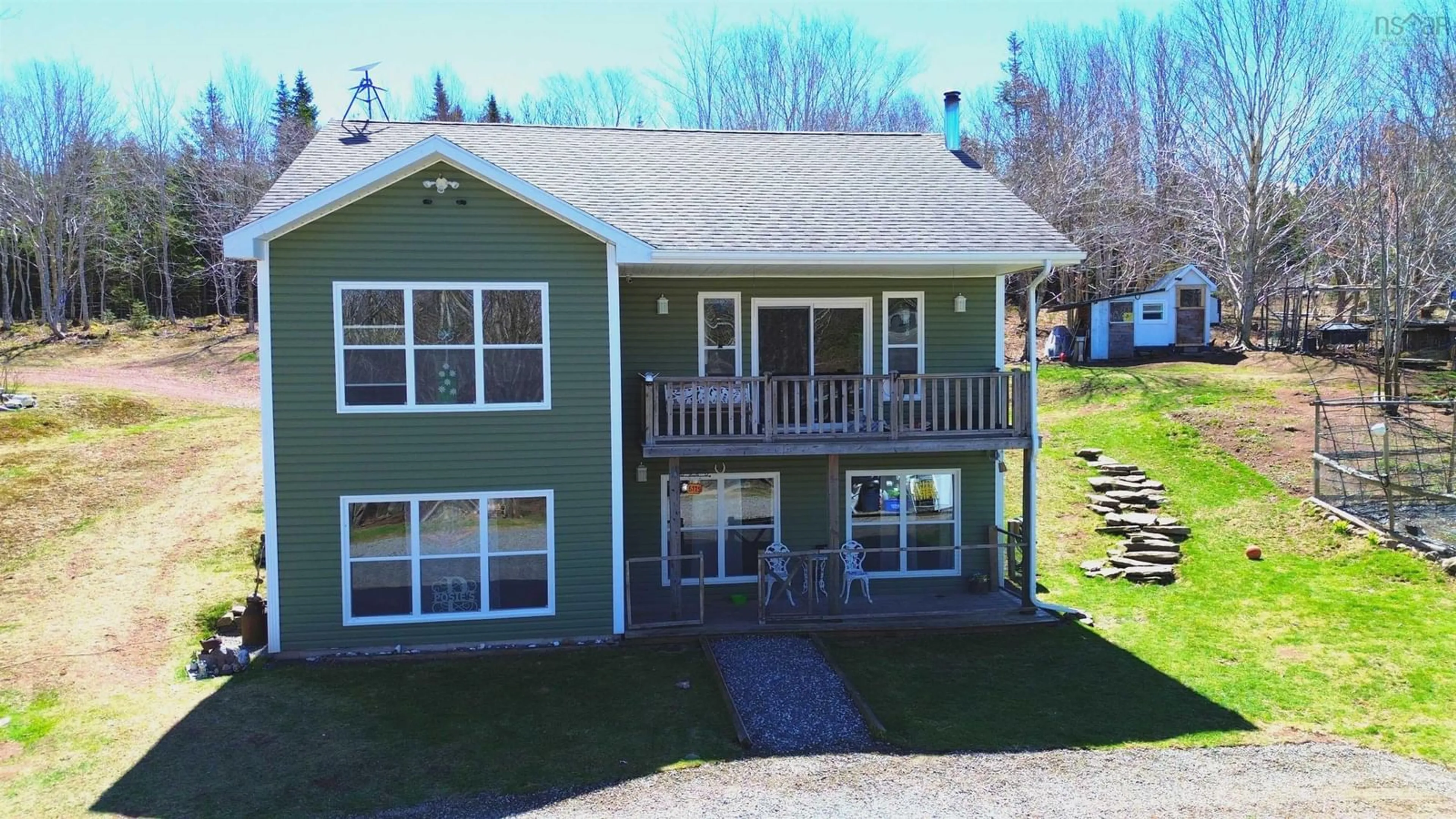 A pic from outside/outdoor area/front of a property/back of a property/a pic from drone, unknown for 6775 Highlands Rd, Christmas Island Nova Scotia B1T 1L8