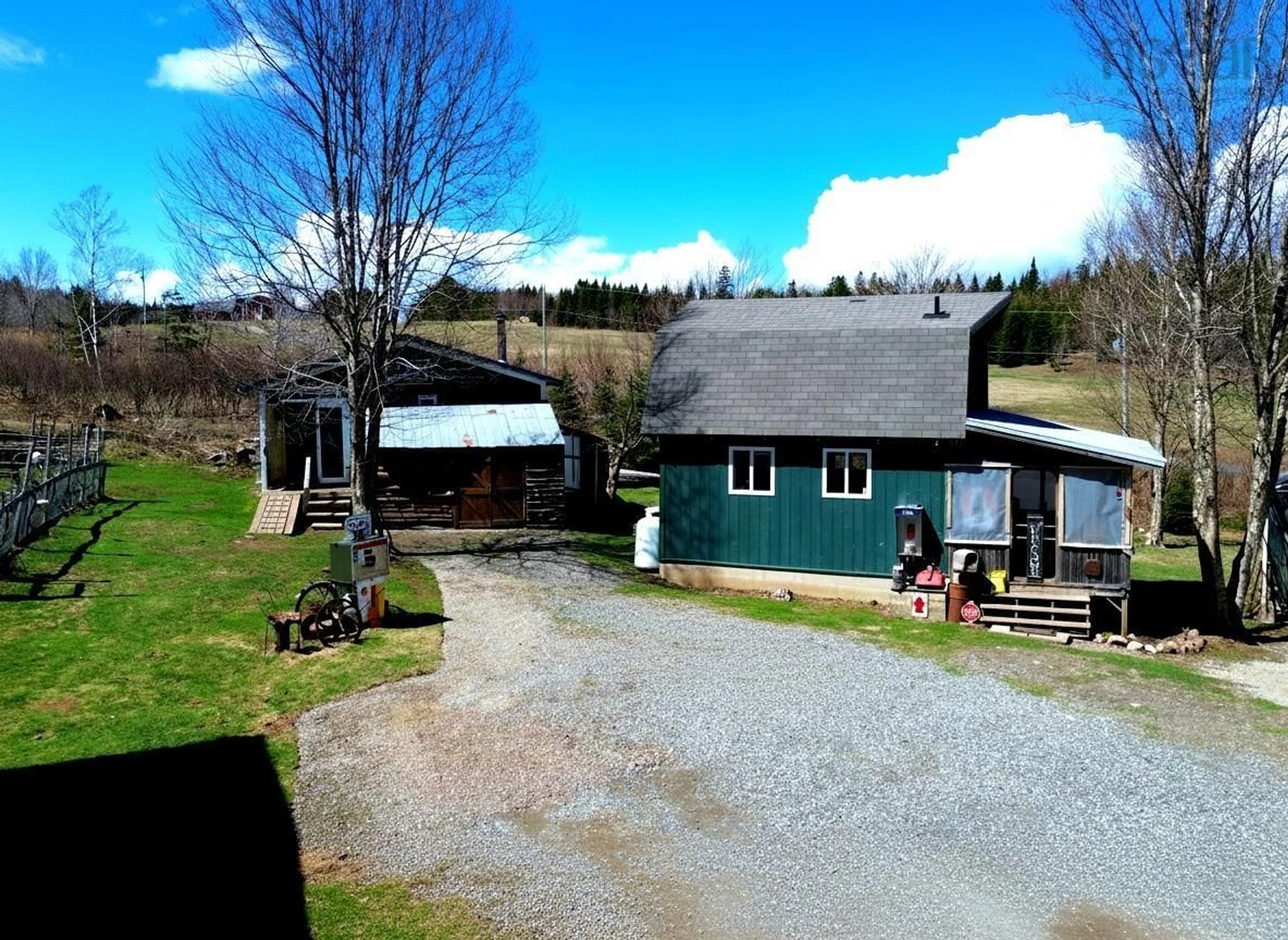 A pic from outside/outdoor area/front of a property/back of a property/a pic from drone, mountain view for 6775 Highlands Rd, Christmas Island Nova Scotia B1T 1L8