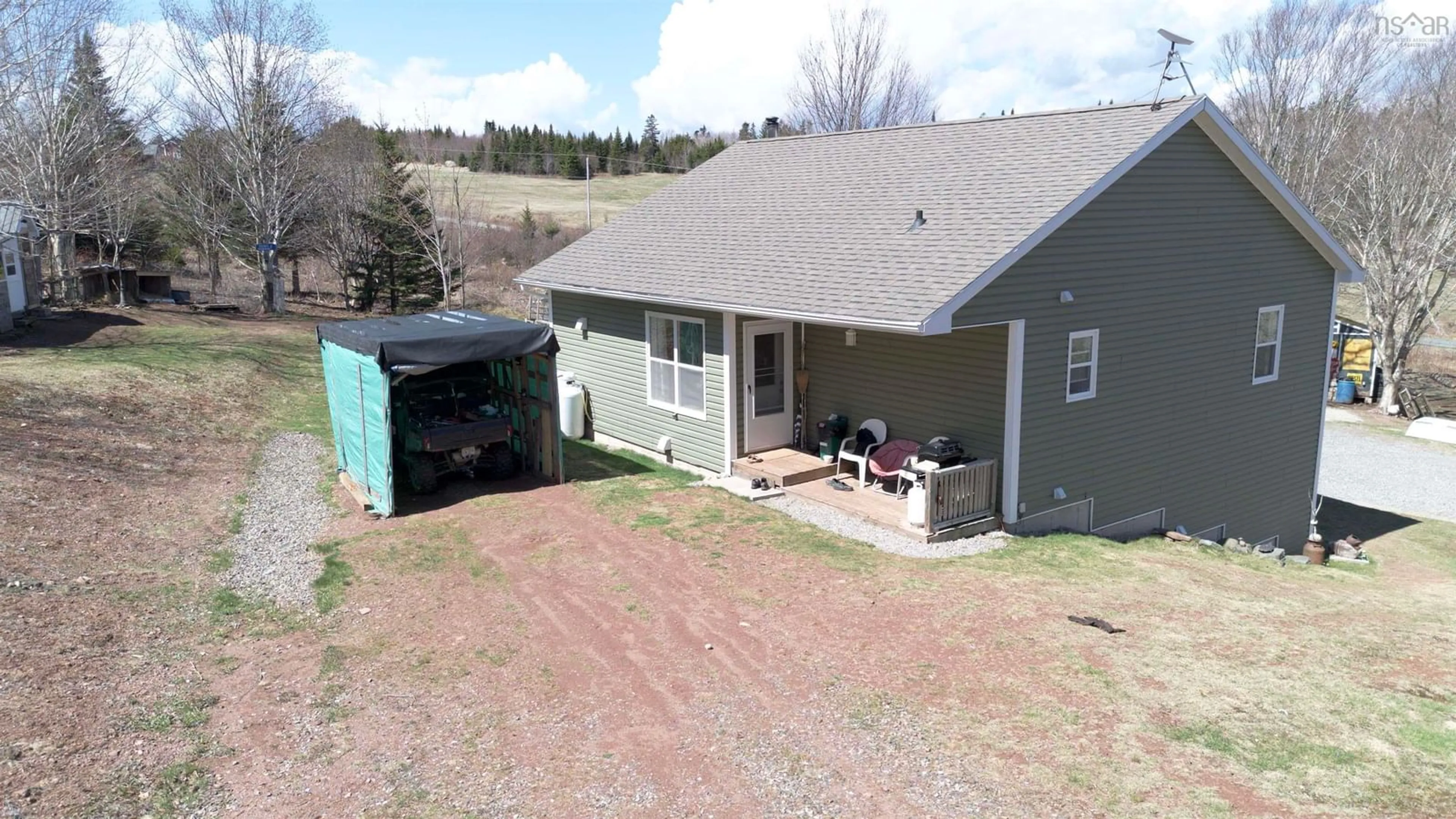 A pic from outside/outdoor area/front of a property/back of a property/a pic from drone, mountain view for 6775 Highlands Rd, Christmas Island Nova Scotia B1T 1L8