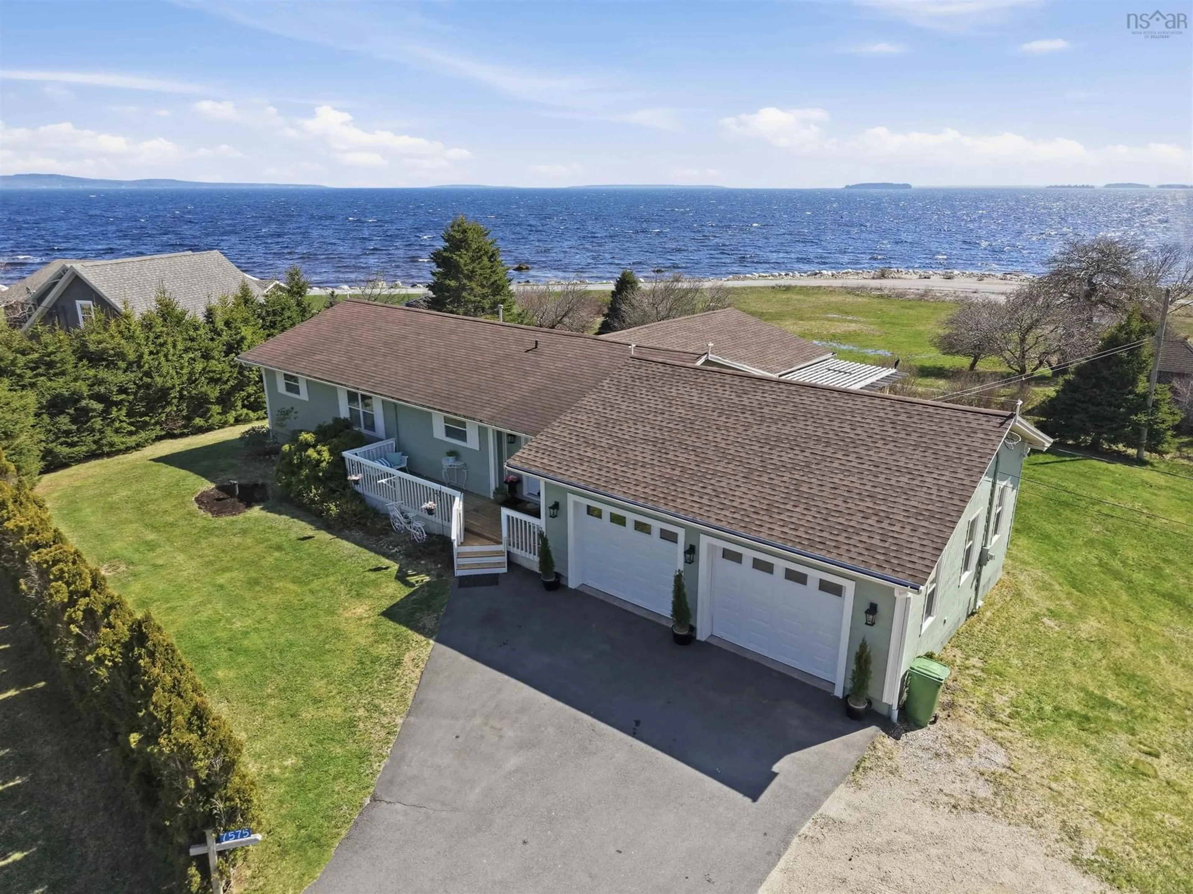 A pic from outside/outdoor area/front of a property/back of a property/a pic from drone, water/lake/river/ocean view for 7575 Highway 329, East River Point Nova Scotia B0J 1T0