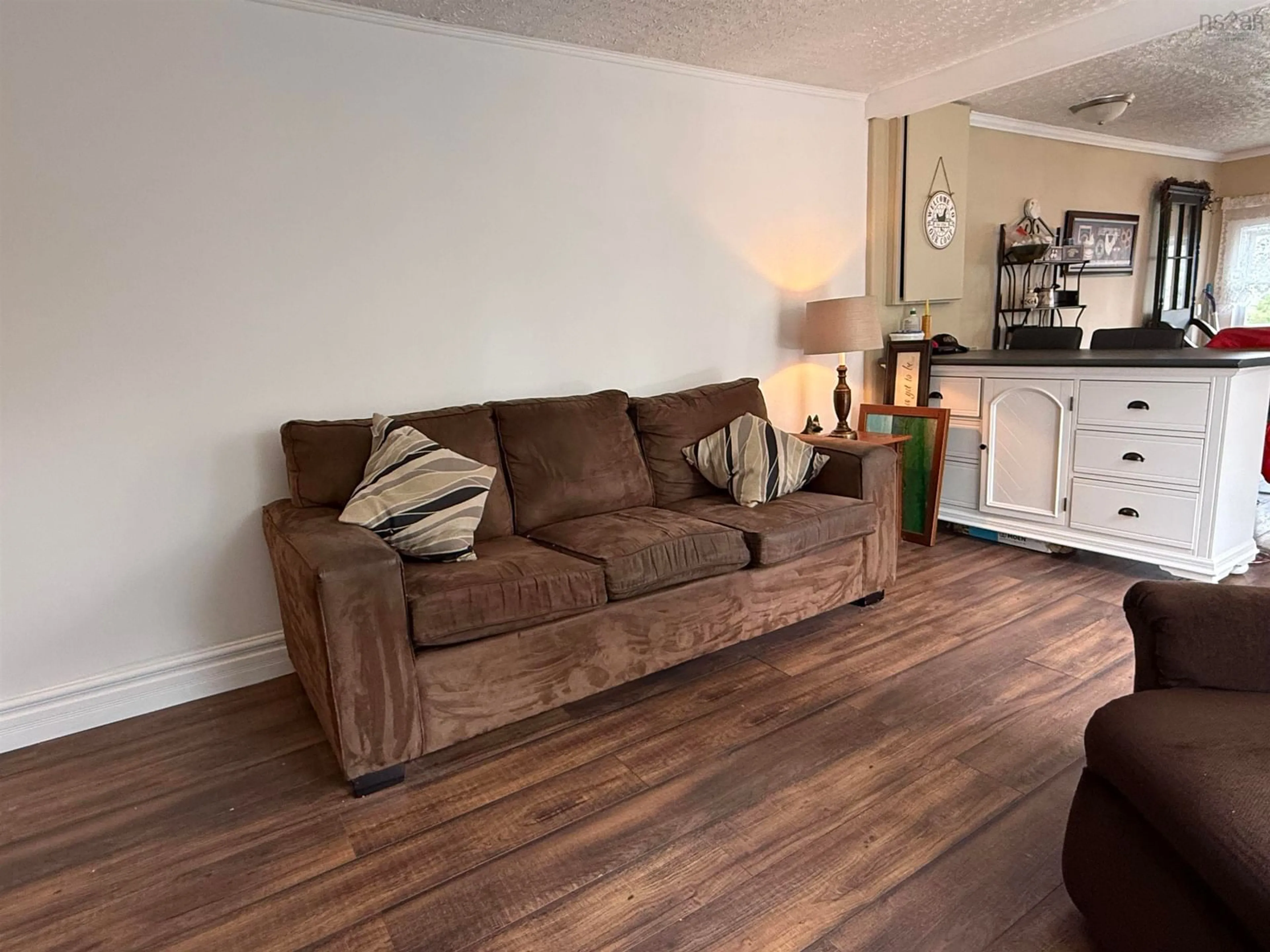 Living room with furniture, wood/laminate floor for Coldwell Court #150, New Minas Nova Scotia B4N 5N3