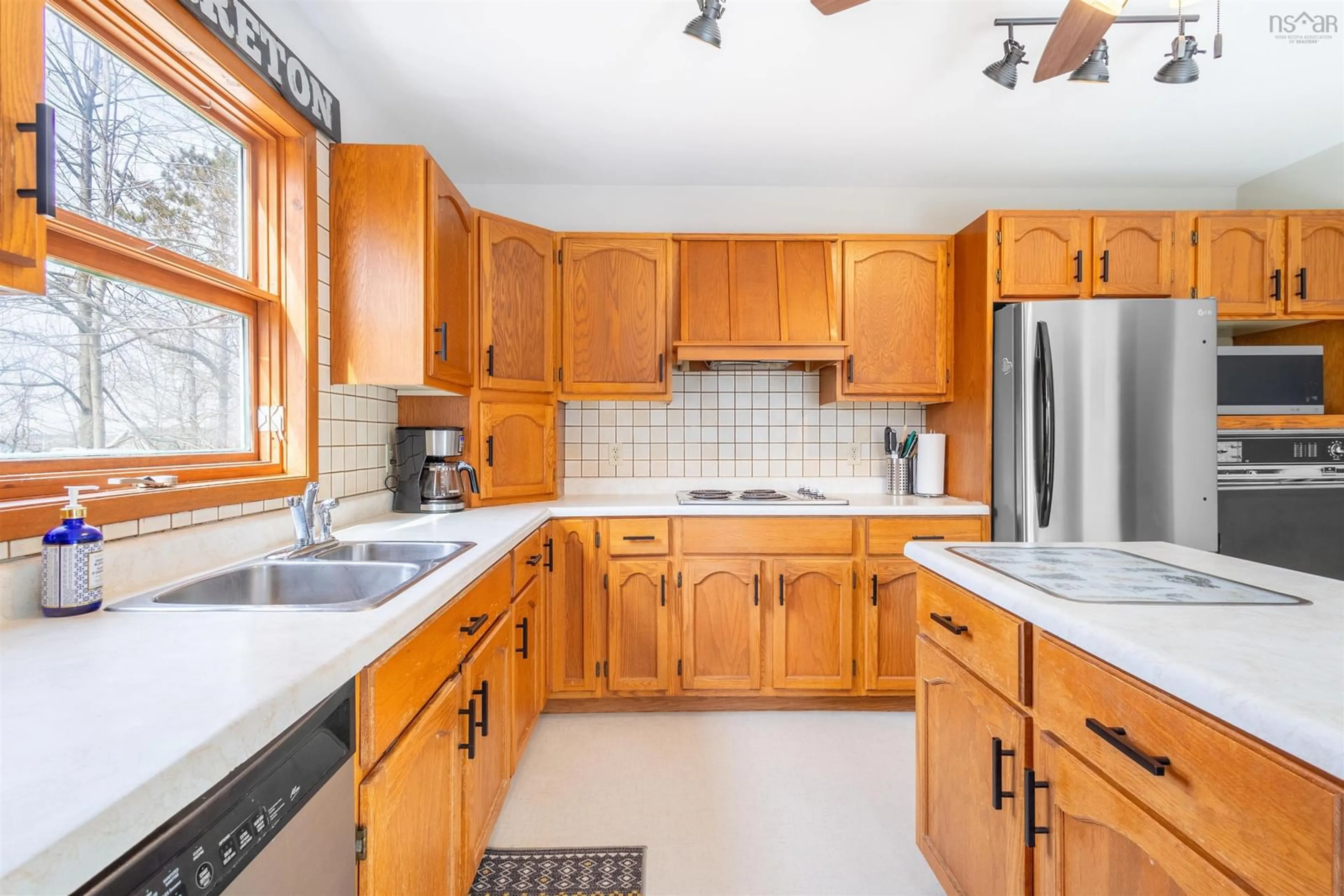 Standard kitchen, ceramic/tile floor for 71 Colby St, Sydney Nova Scotia B1P 3P9