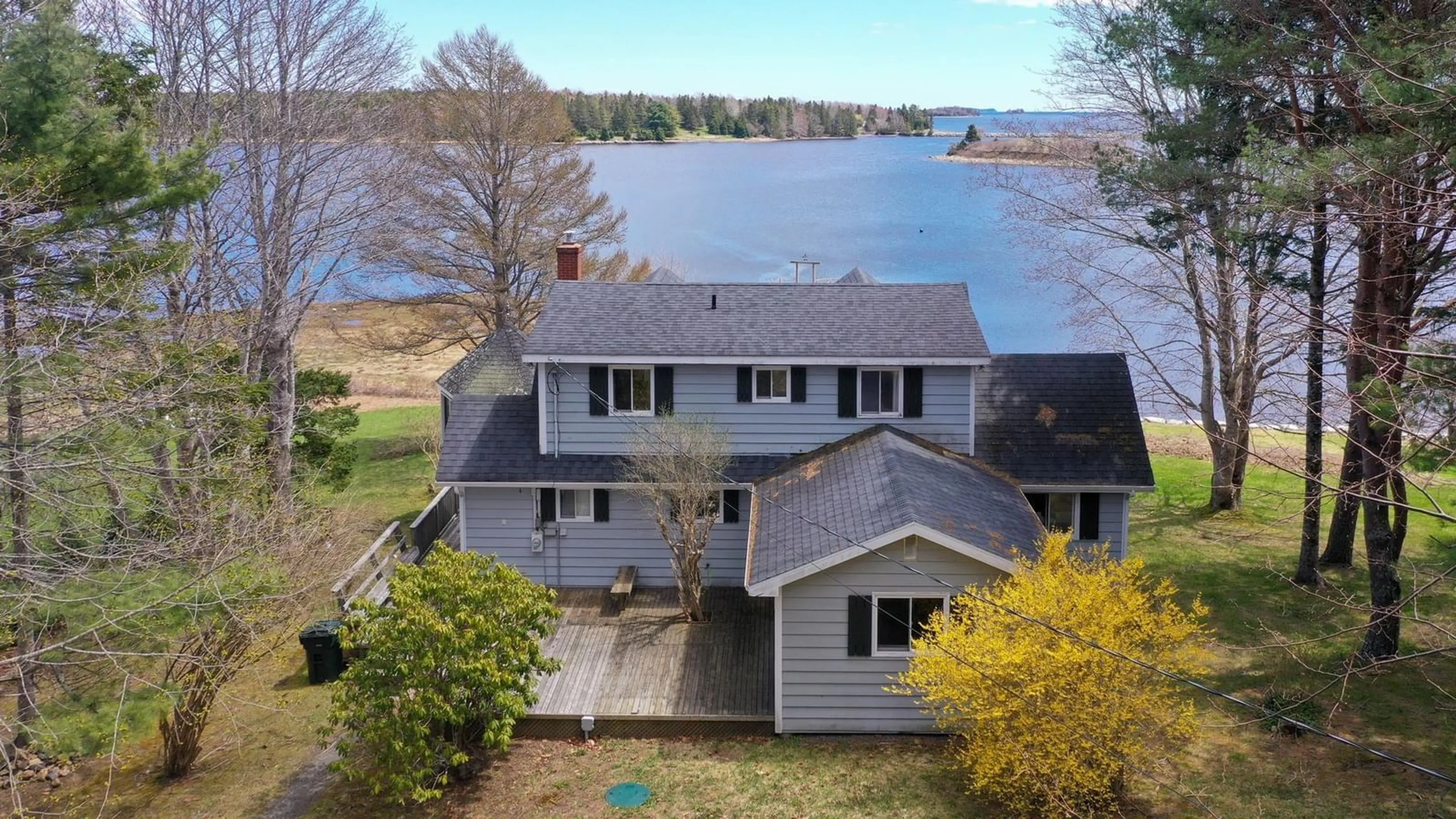 A pic from outside/outdoor area/front of a property/back of a property/a pic from drone, water/lake/river/ocean view for 45 Little Vaughan Lake Road, Western Shore Nova Scotia B0J 3M0