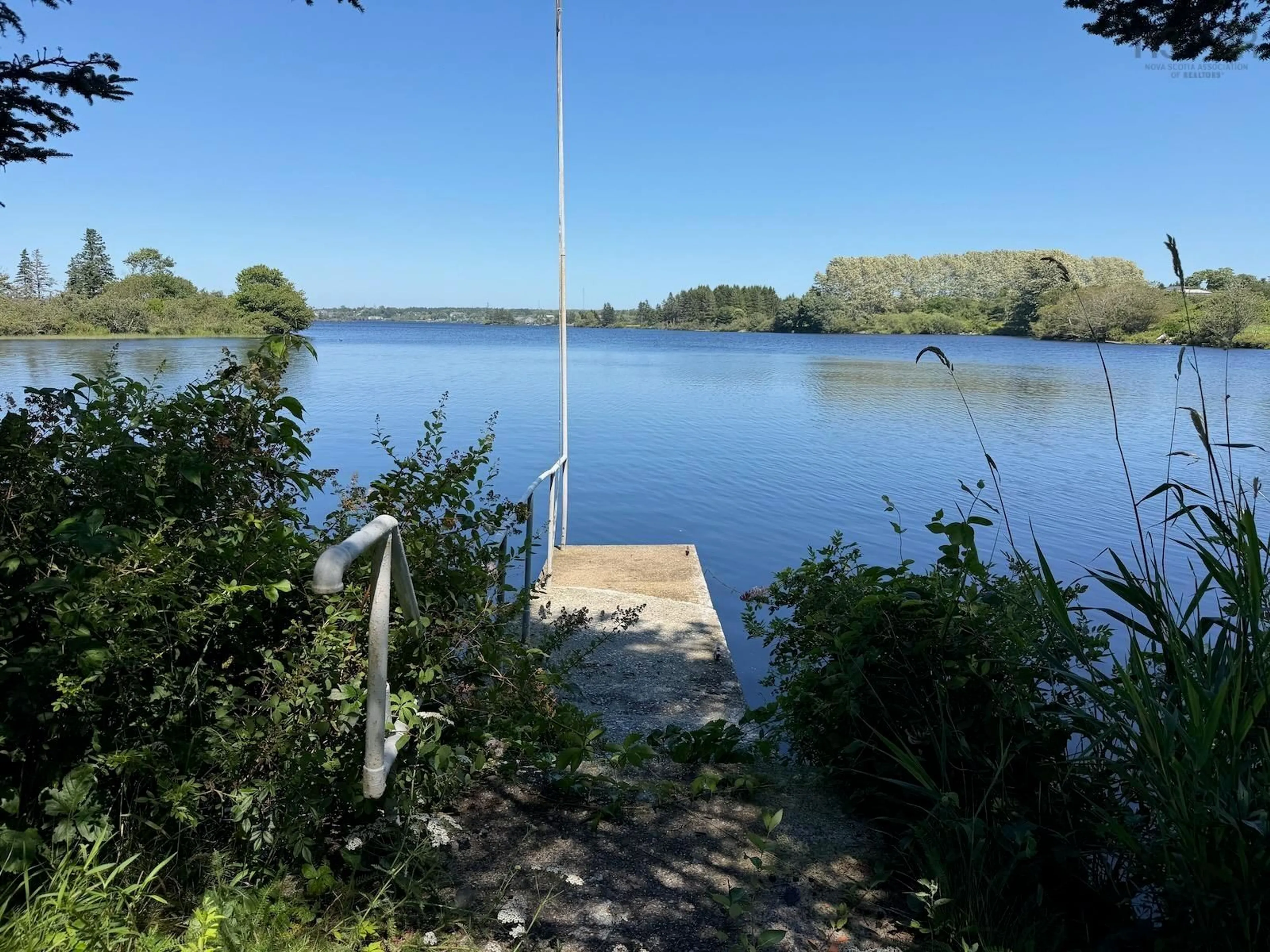 A pic from outside/outdoor area/front of a property/back of a property/a pic from drone, water/lake/river/ocean view for 42 Dayton Rd, Dayton Nova Scotia B5A 5K5