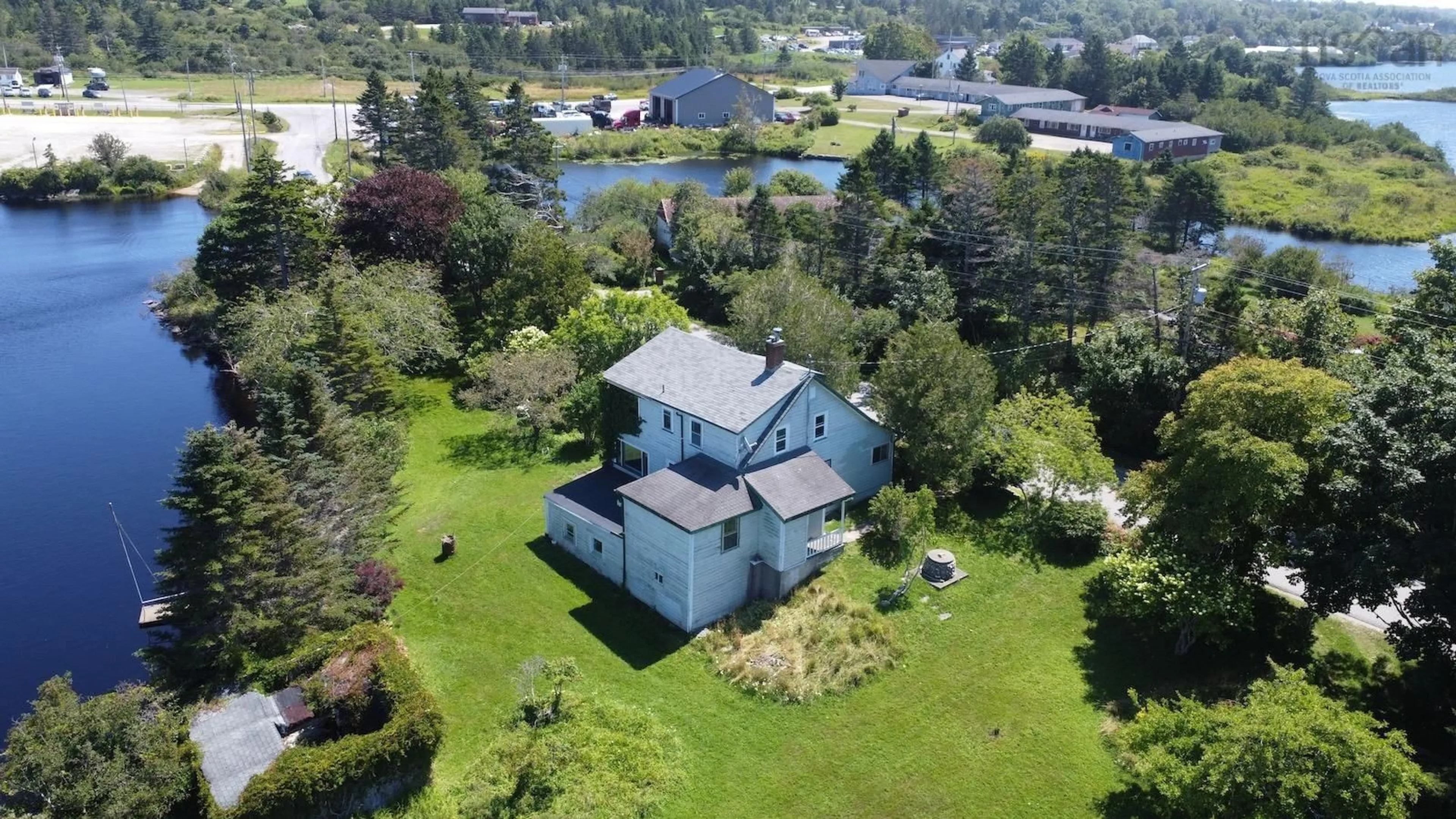 A pic from outside/outdoor area/front of a property/back of a property/a pic from drone, water/lake/river/ocean view for 42 Dayton Rd, Dayton Nova Scotia B5A 5K5