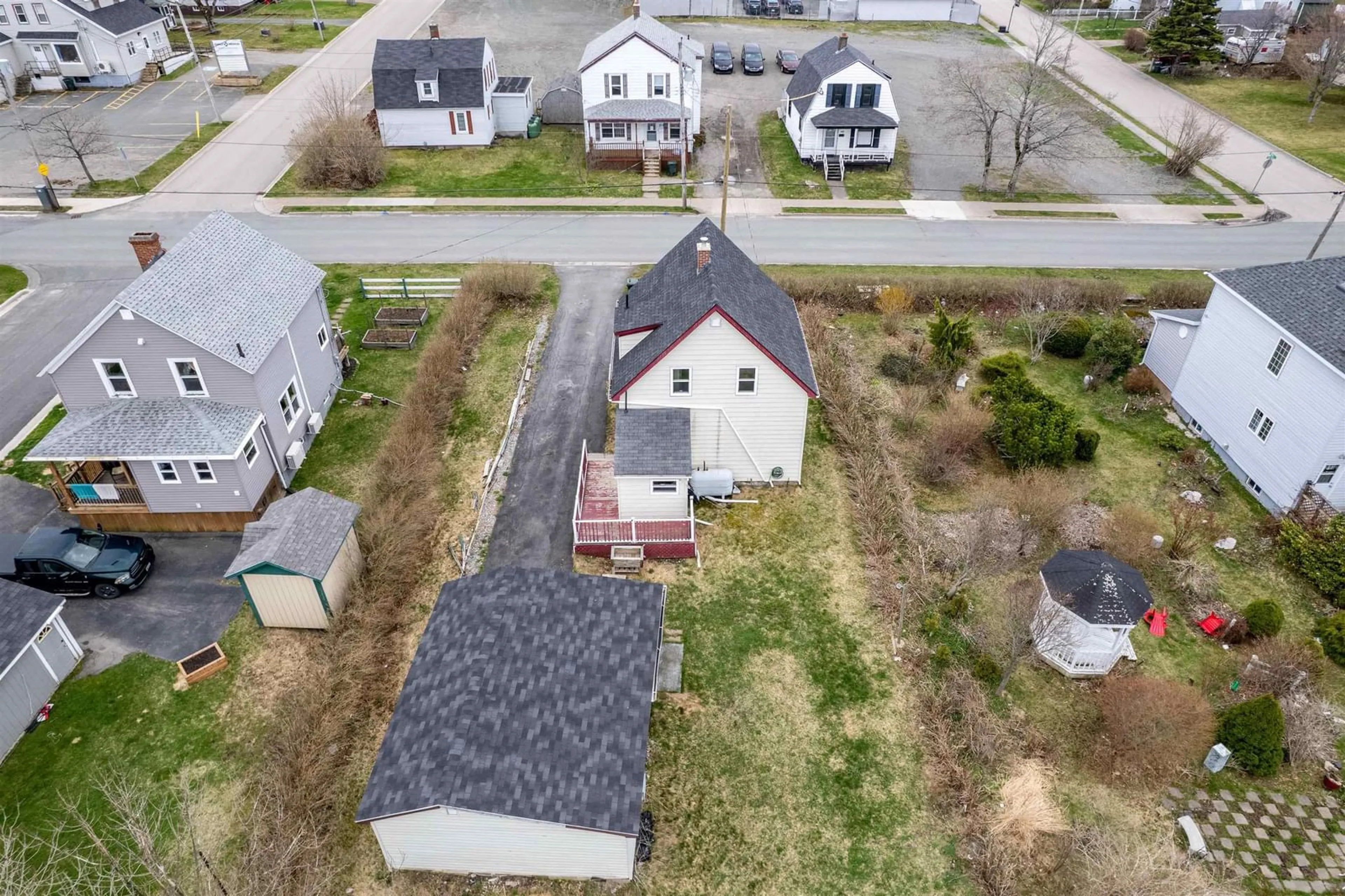 A pic from outside/outdoor area/front of a property/back of a property/a pic from drone, street for Vulcan Ave #145, Sydney Nova Scotia B1P 5W3