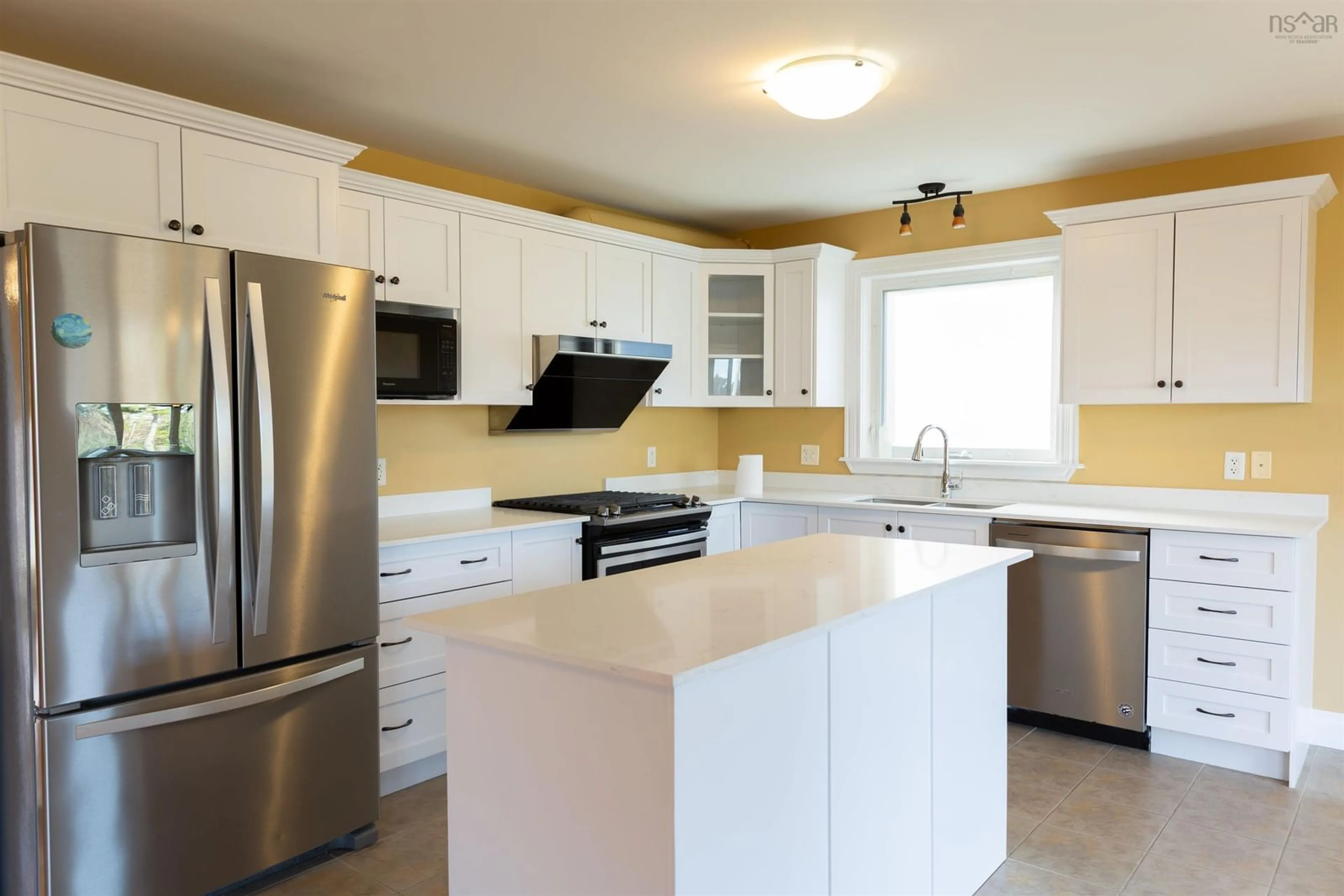 Open concept kitchen, ceramic/tile floor for 33 Haystead Ridge, Bedford Nova Scotia B4A 0B6
