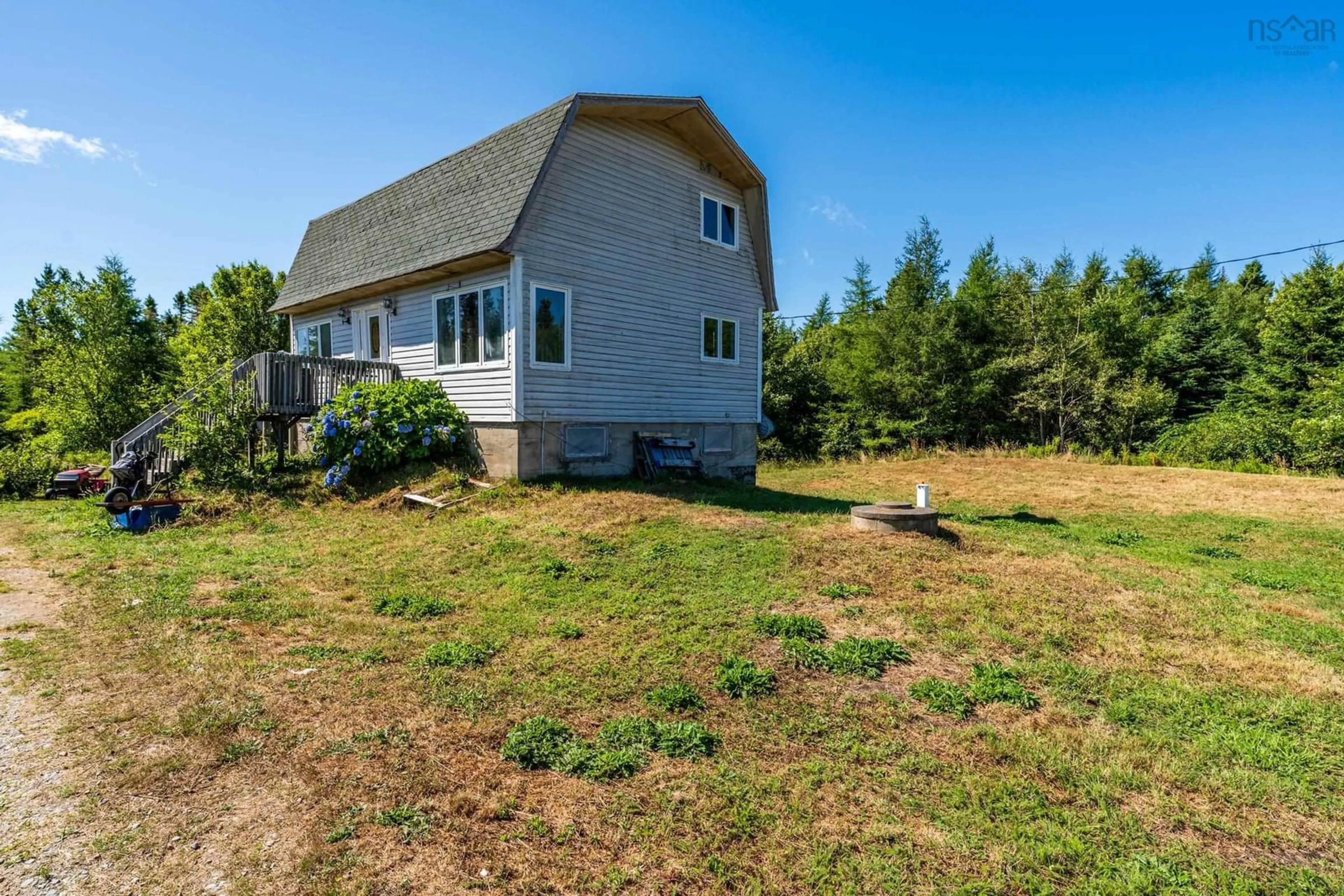 A pic from outside/outdoor area/front of a property/back of a property/a pic from drone, water/lake/river/ocean view for 47 Golden Glow Lane, Little River Harbour Nova Scotia B0W 1B0