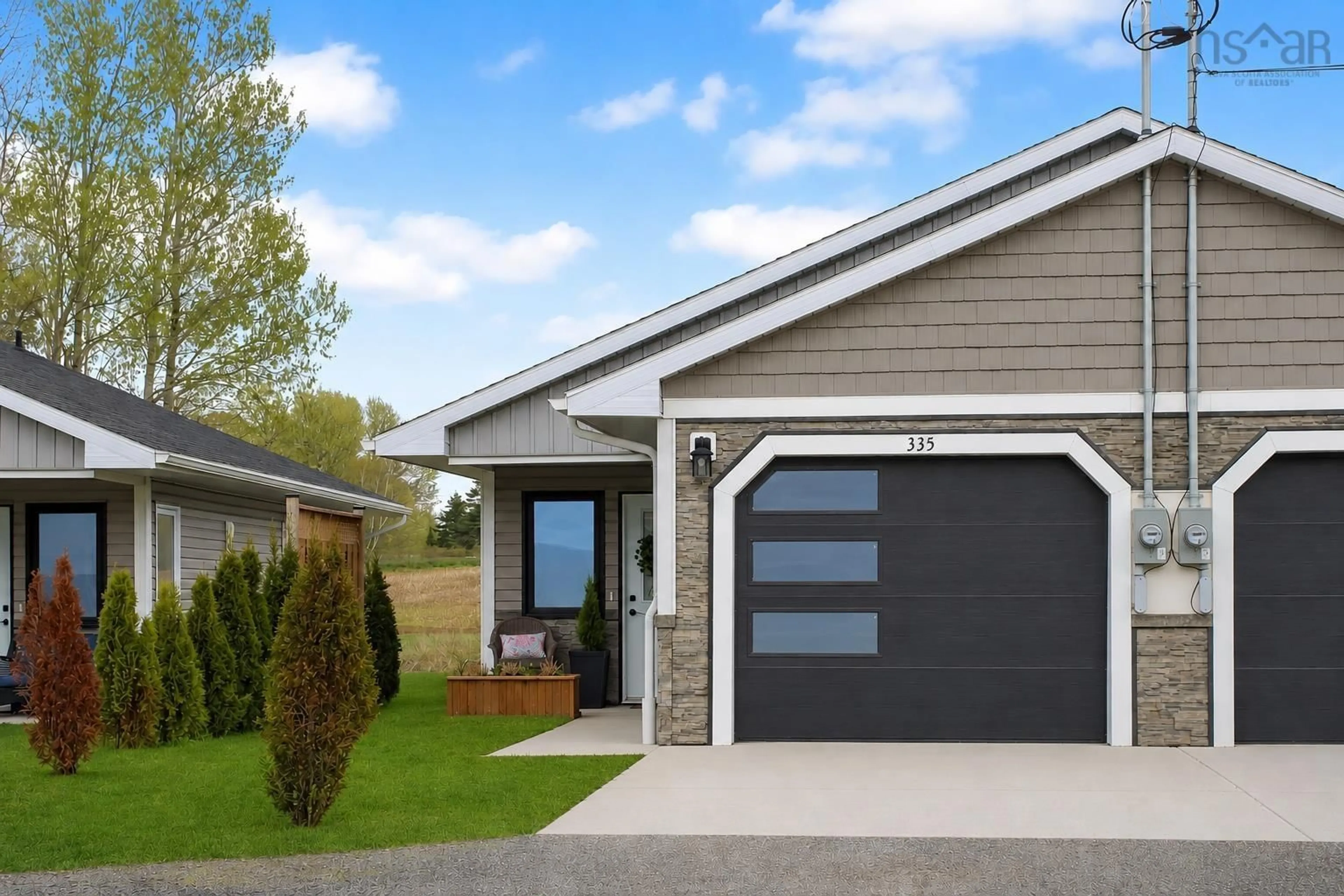 Home with vinyl exterior material, street for 335 Nichols Ave, North Kentville Nova Scotia B4N 3V7