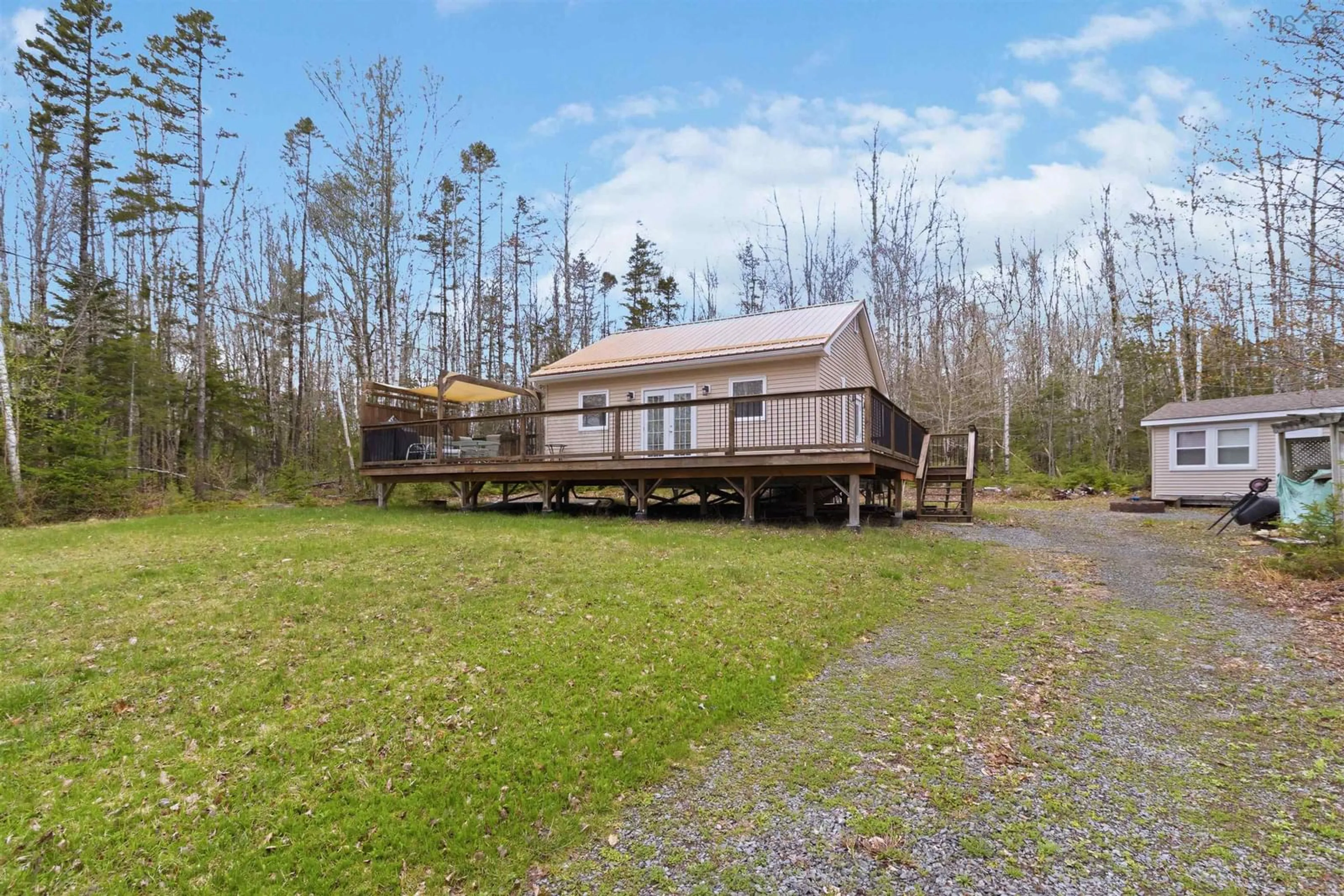 A pic from outside/outdoor area/front of a property/back of a property/a pic from drone, water/lake/river/ocean view for 630 Elmwood Exten, Barss Corner Nova Scotia B0R 1A0