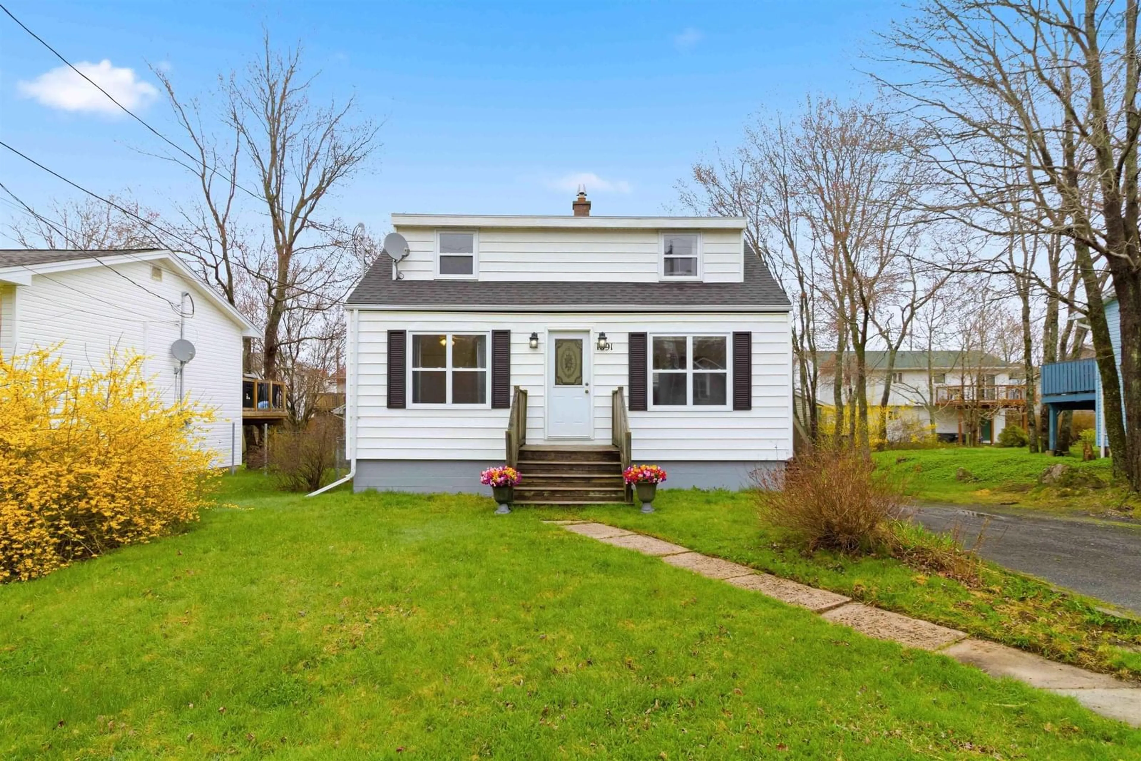 Home with vinyl exterior material, street for 1691 St. Margaret's Bay Rd, Timberlea Nova Scotia B3T 1B4