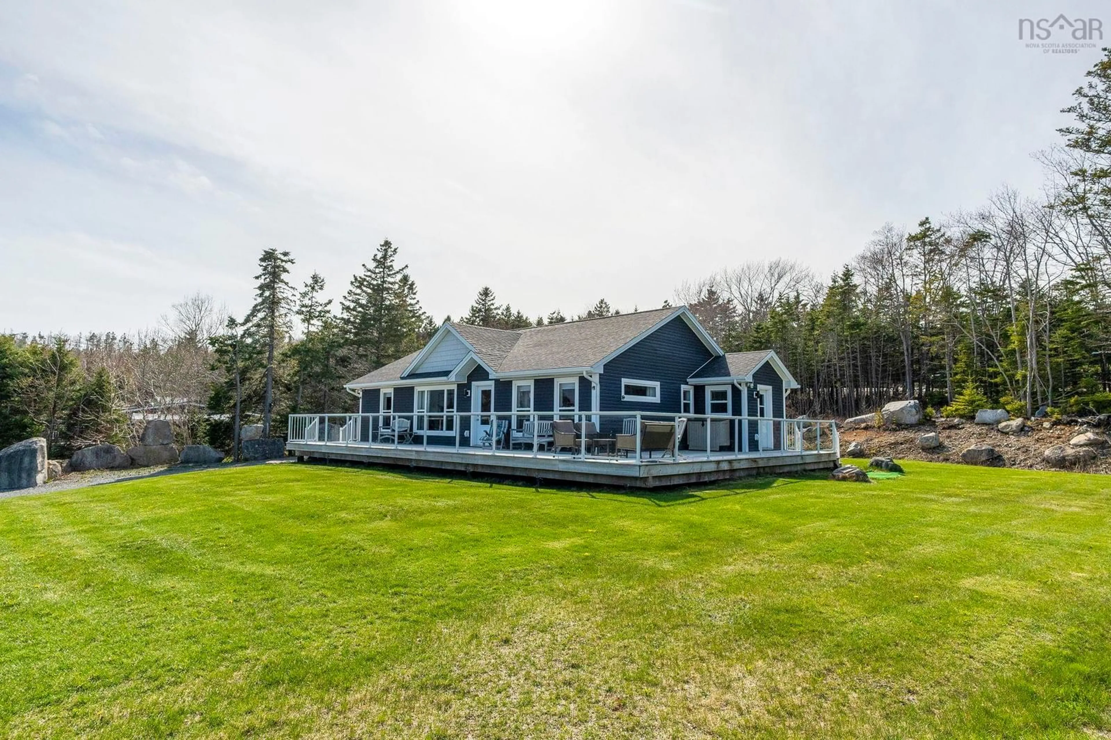 A pic from outside/outdoor area/front of a property/back of a property/a pic from drone, water/lake/river/ocean view for 27 Prospect Bay Rd, Prospect Bay Nova Scotia B3T 1Z4