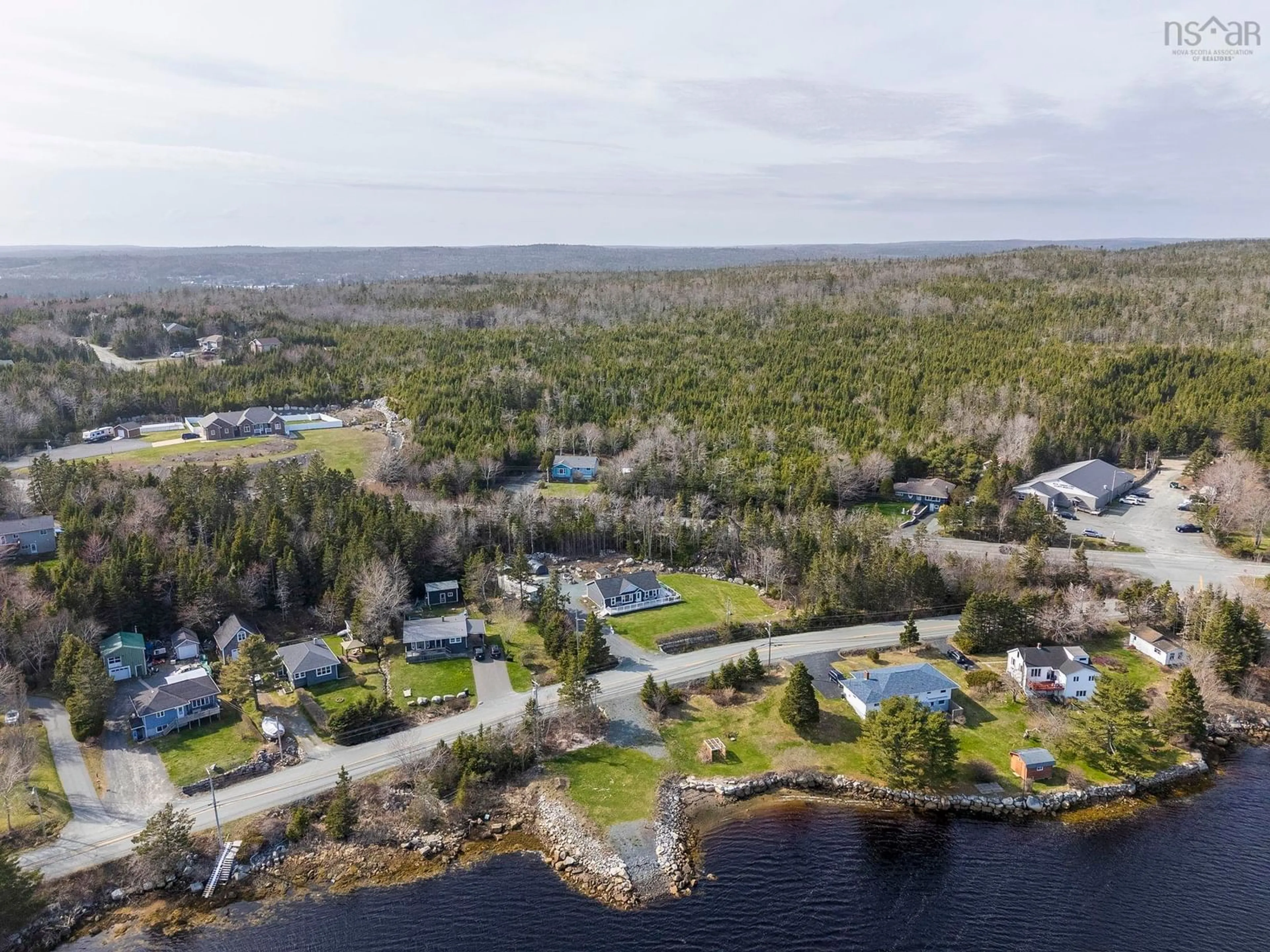A pic from outside/outdoor area/front of a property/back of a property/a pic from drone, water/lake/river/ocean view for 27 Prospect Bay Rd, Prospect Bay Nova Scotia B3T 1Z4