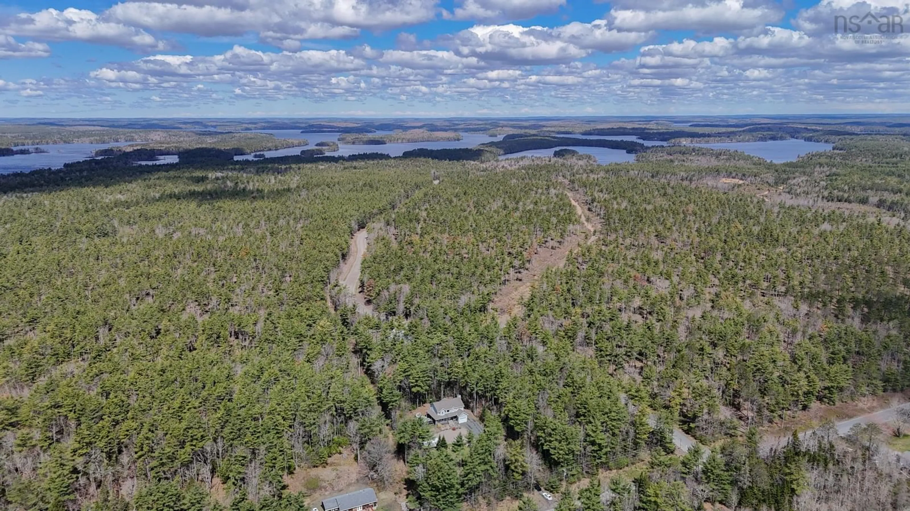 A pic from outside/outdoor area/front of a property/back of a property/a pic from drone, forest/trees view for 4876 Highway 210, Greenfield Nova Scotia B0T 1E0