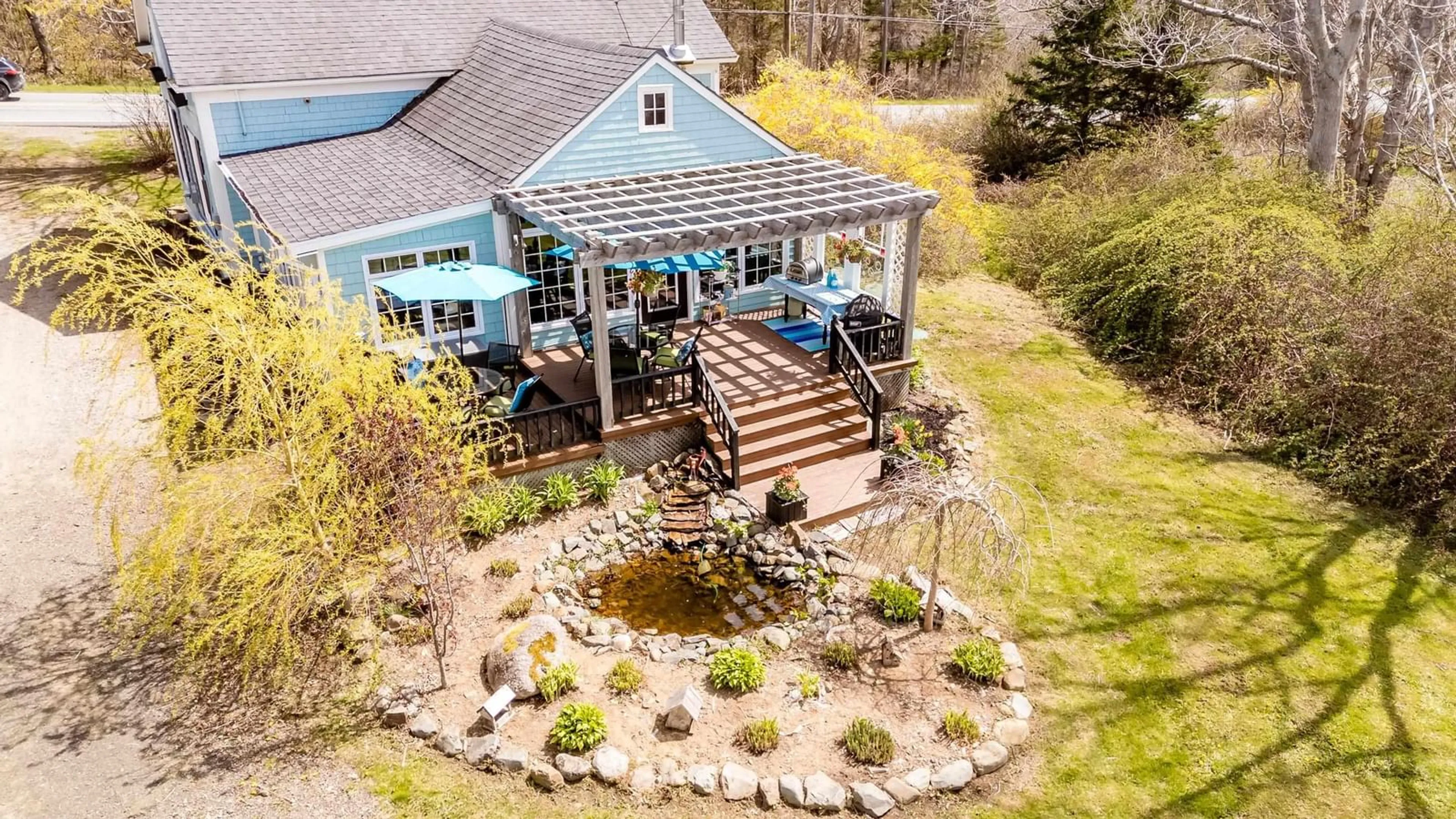 A pic from outside/outdoor area/front of a property/back of a property/a pic from drone, water/lake/river/ocean view for 8367 Highway 101, Brighton Nova Scotia B0V 1A0