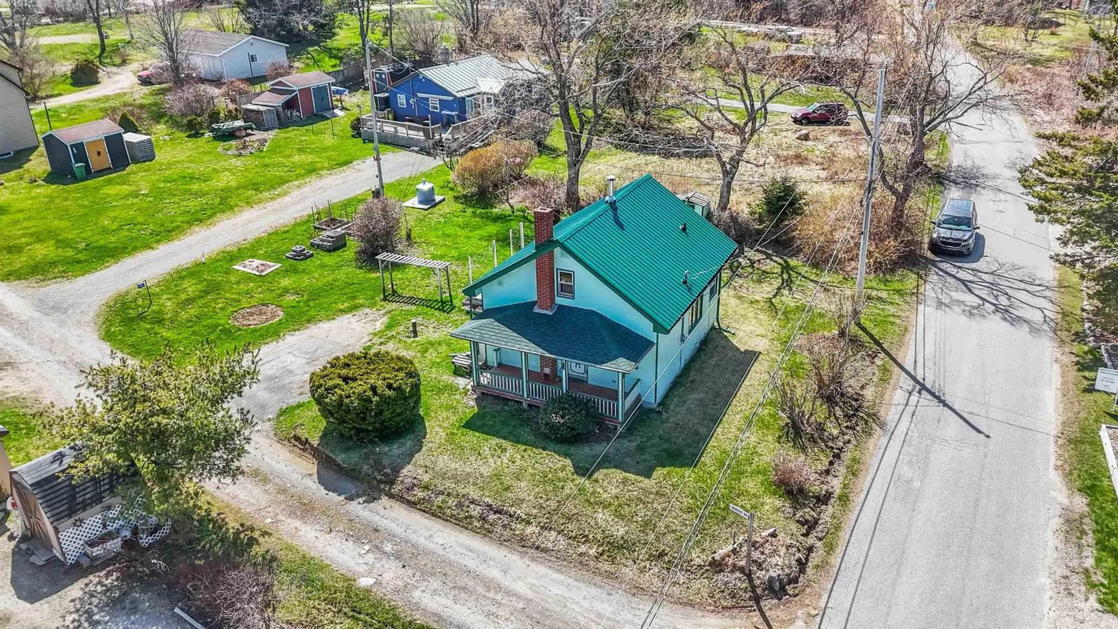 A pic from outside/outdoor area/front of a property/back of a property/a pic from drone, street for 4 Herbert Rd, Western Shore Nova Scotia B0J 3M0