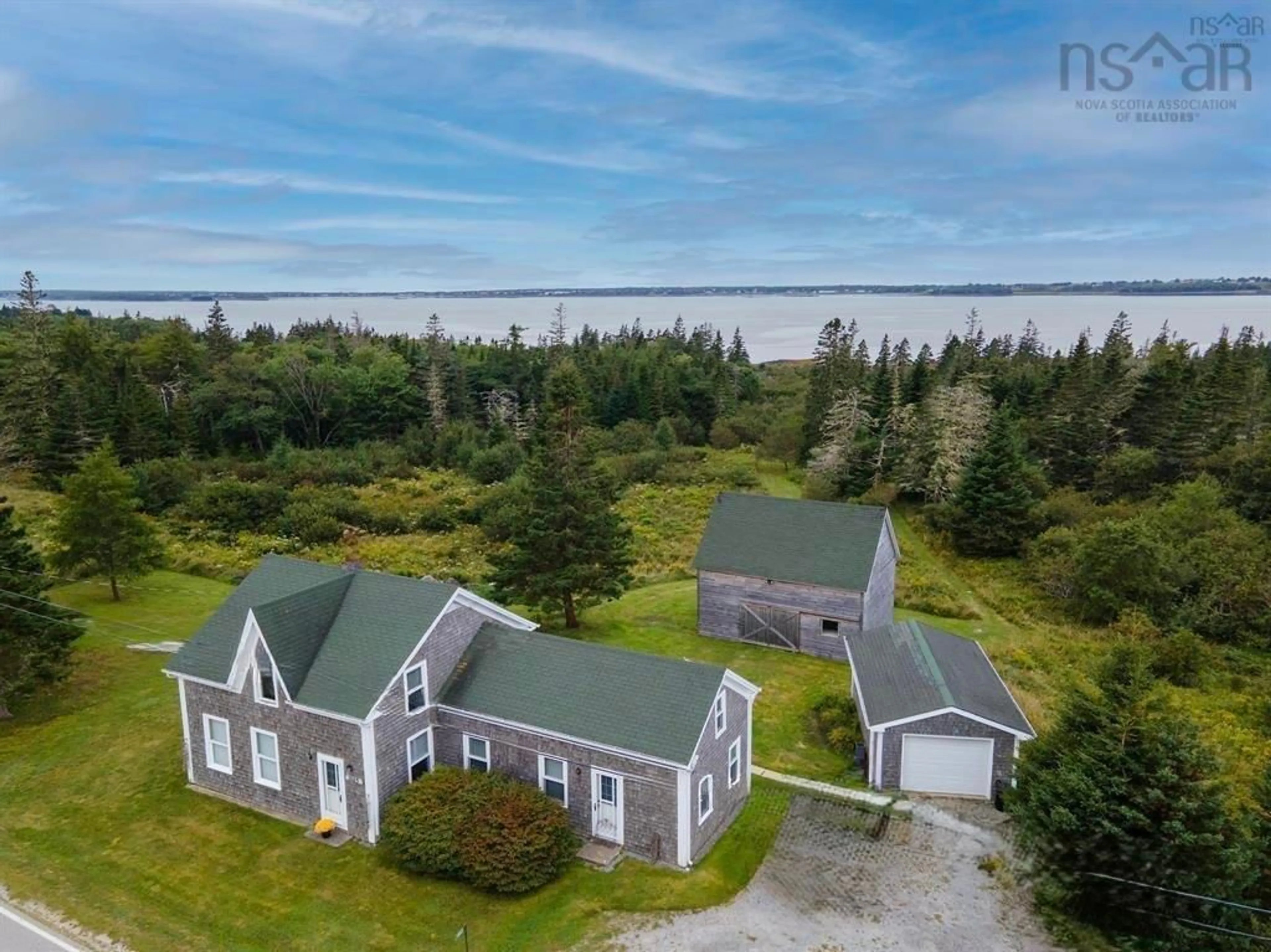 A pic from outside/outdoor area/front of a property/back of a property/a pic from drone, water/lake/river/ocean view for 1663 Highway 3, East Pubnico Nova Scotia B0W 2A0