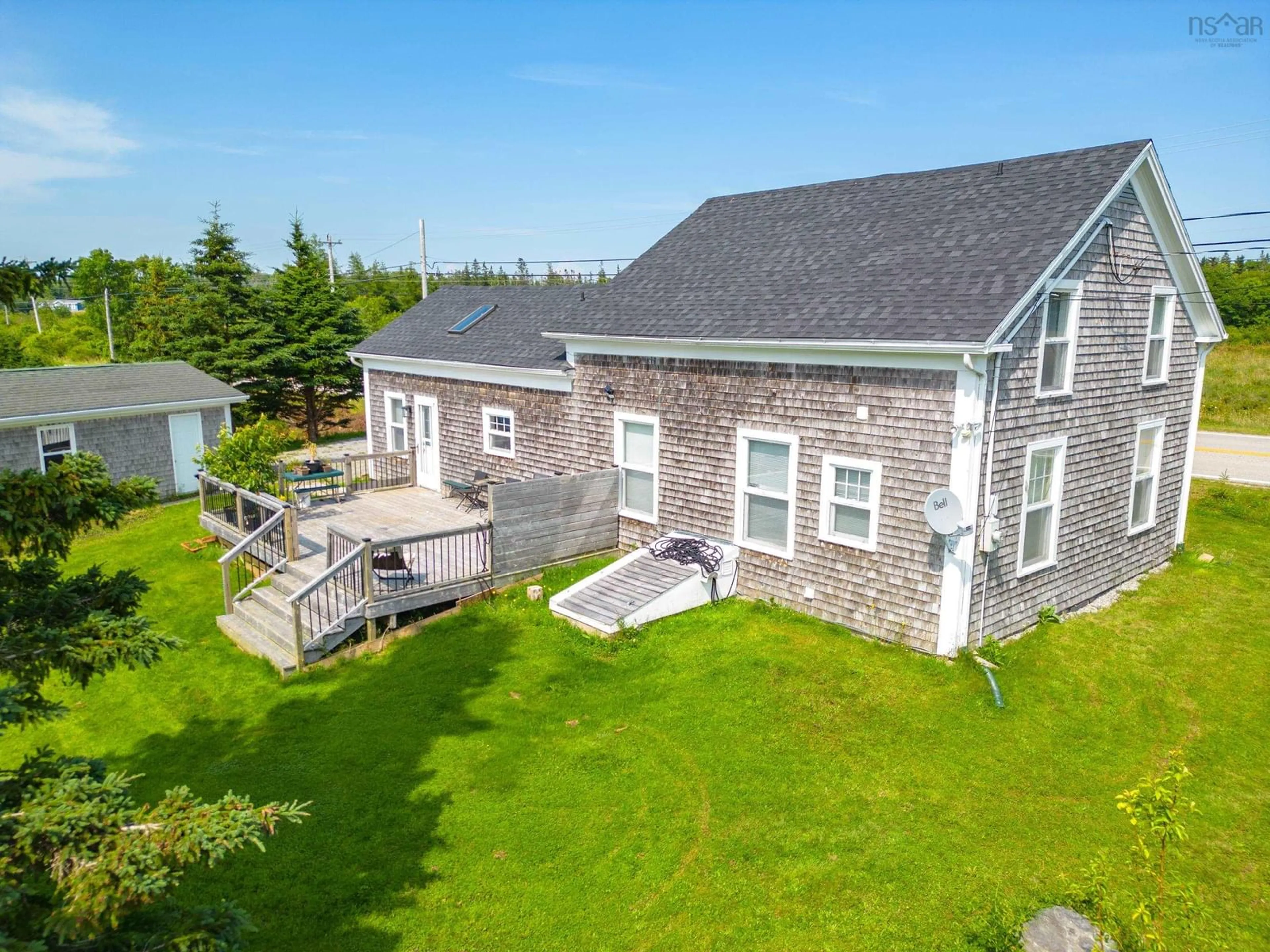 A pic from outside/outdoor area/front of a property/back of a property/a pic from drone, unknown for 1663 Highway 3, East Pubnico Nova Scotia B0W 2A0