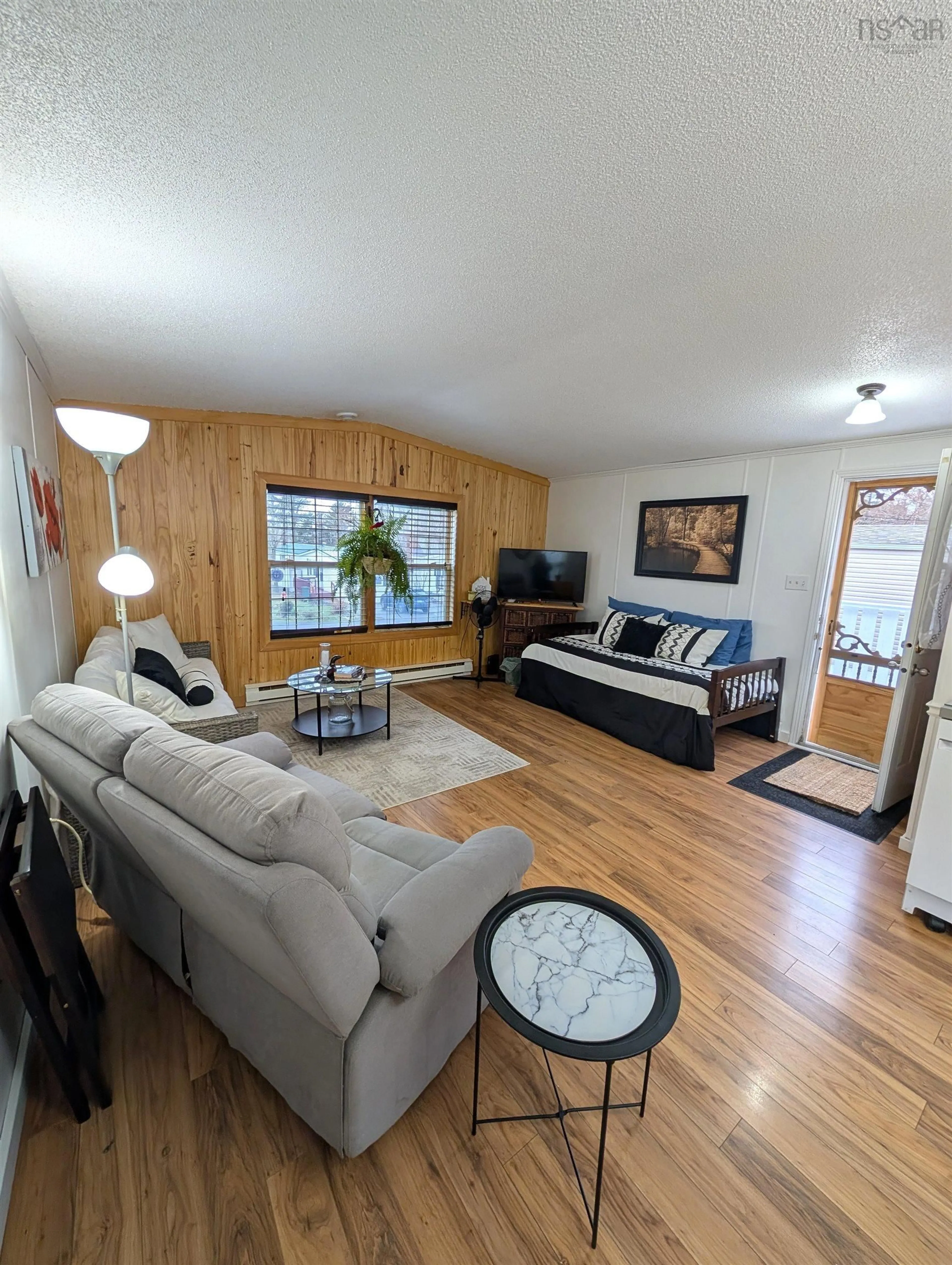 Living room with furniture, wood/laminate floor for 8 Summer Cres, Bridgewater Nova Scotia B4V 3P3