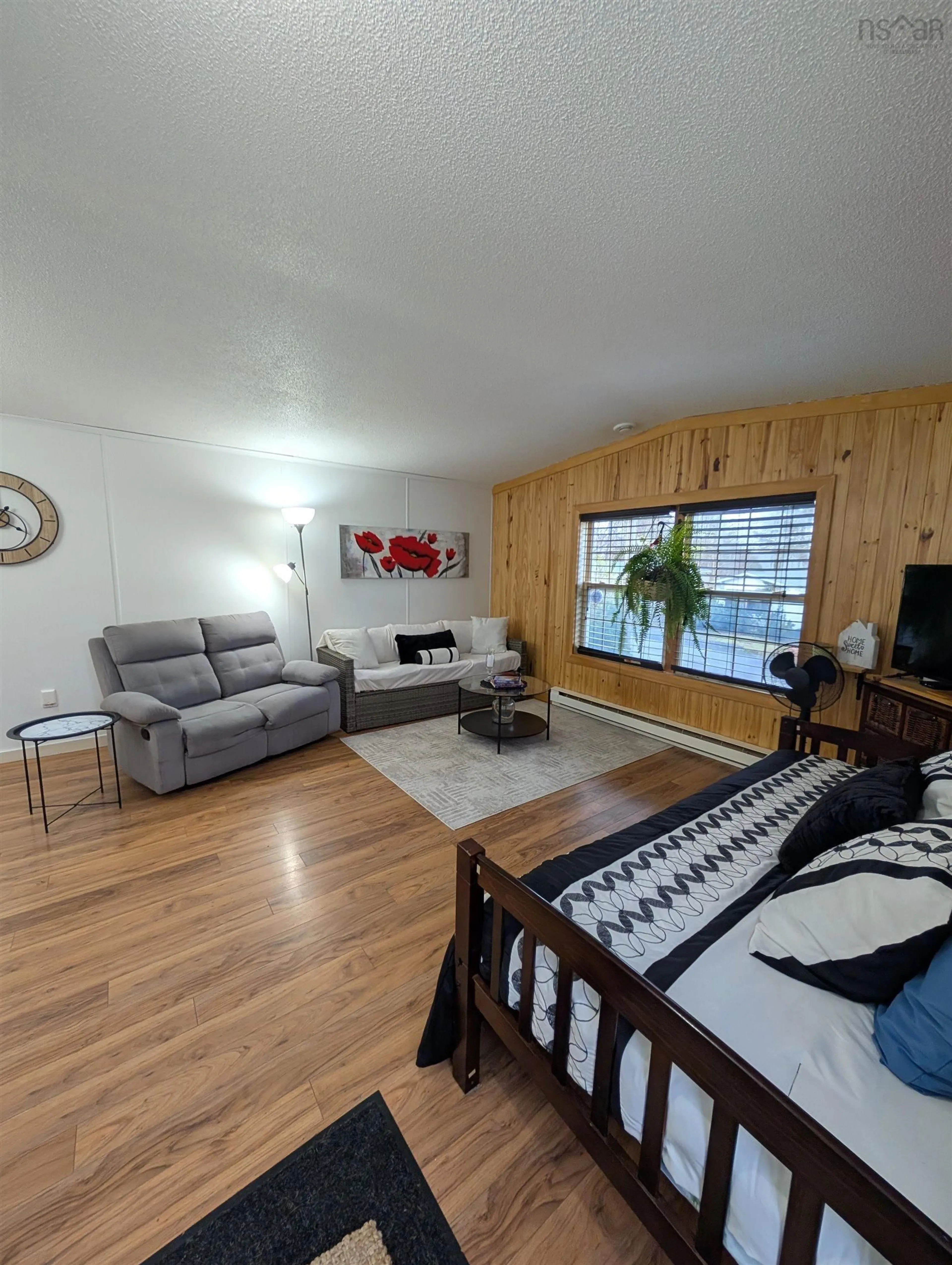 Living room with furniture, wood/laminate floor for 8 Summer Cres, Bridgewater Nova Scotia B4V 3P3